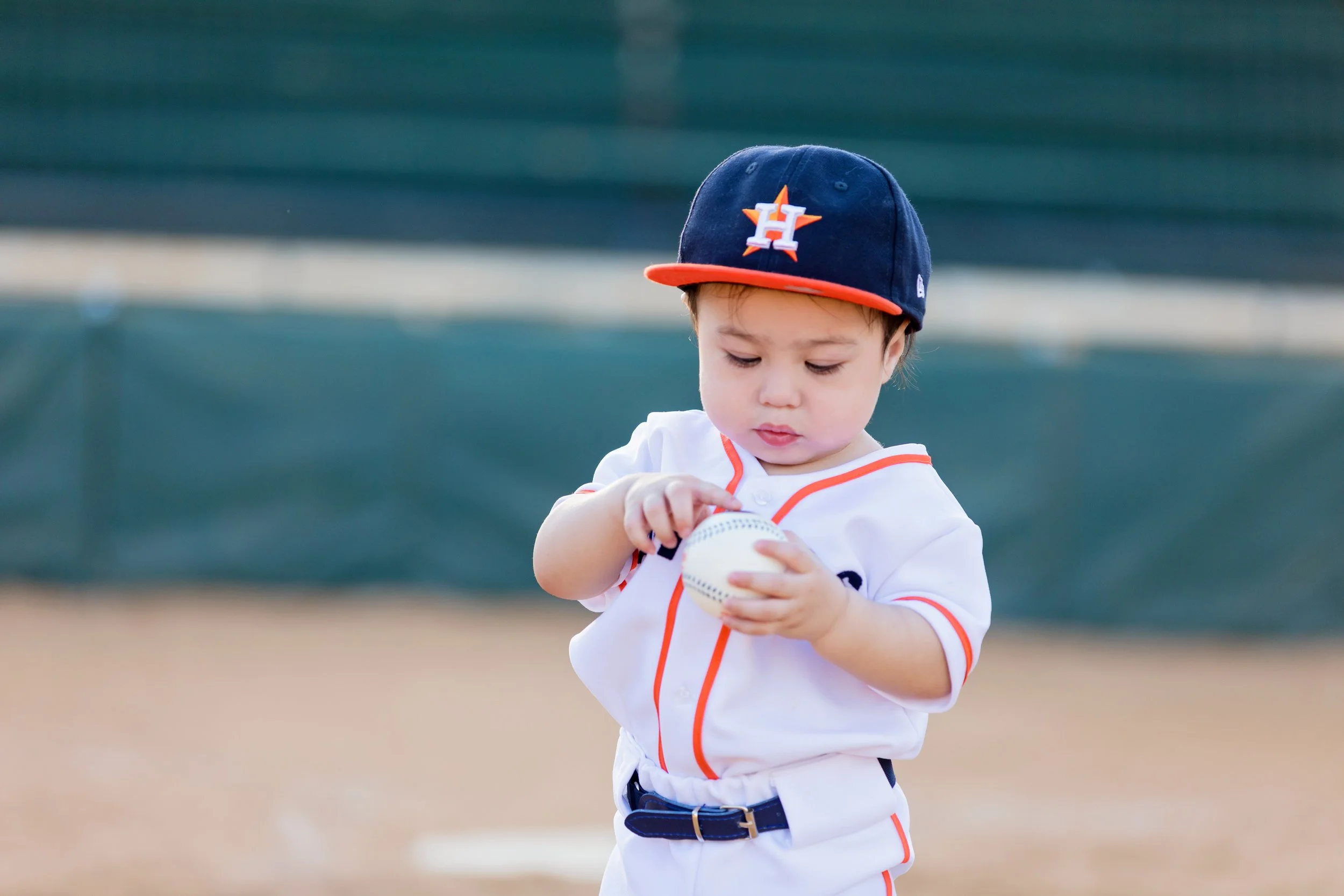 one-year-old-playing-baseball-field.jpg