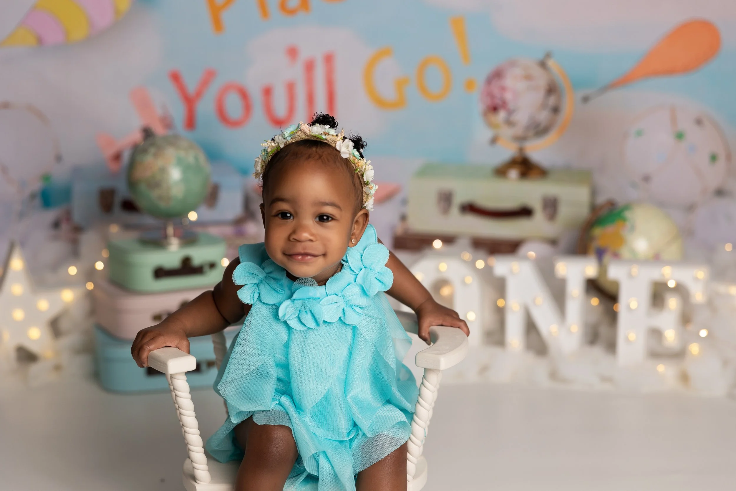 Oh The Places You’ll Go cake smash theme – first birthday girl portrait