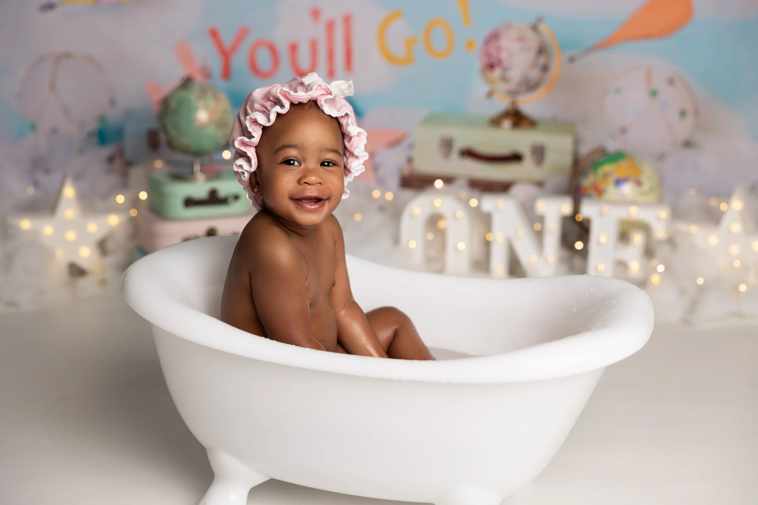 Cake smash bath photo – Oh The Places You’ll Go theme first birthday