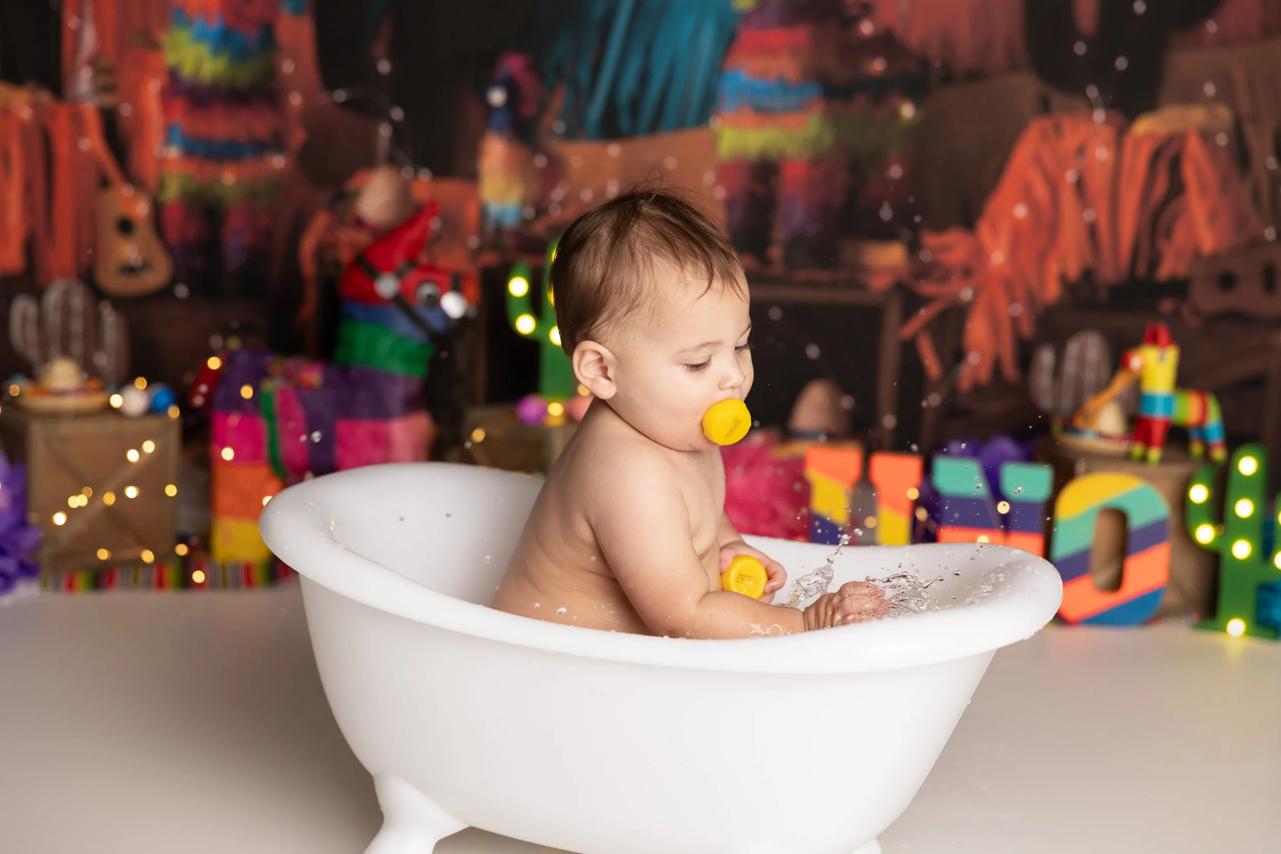 Cake smash bath photo – fiesta theme first birthday cleanup