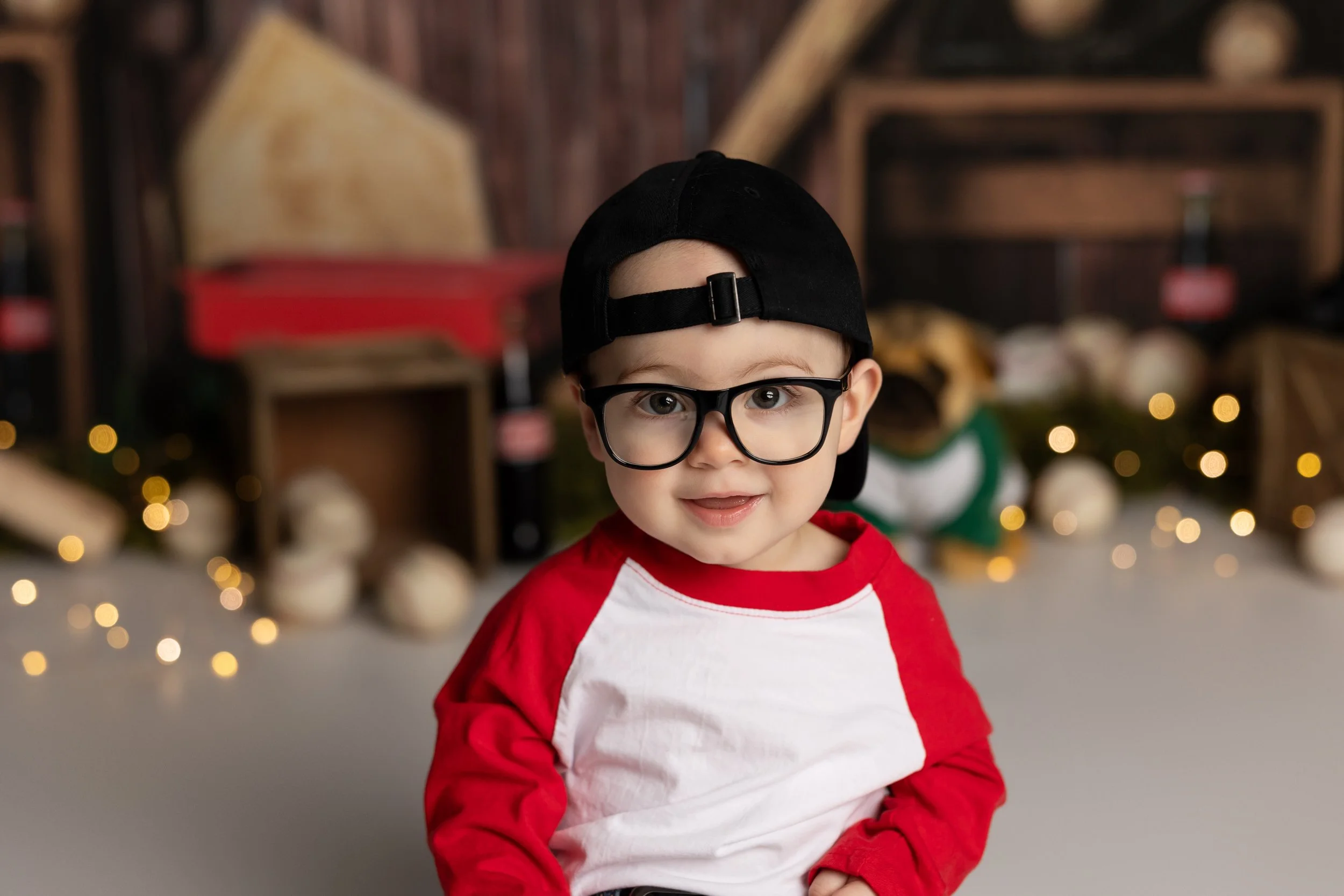 Sandlot baseball cake smash theme – first birthday boy portrait with vintage baseball setup