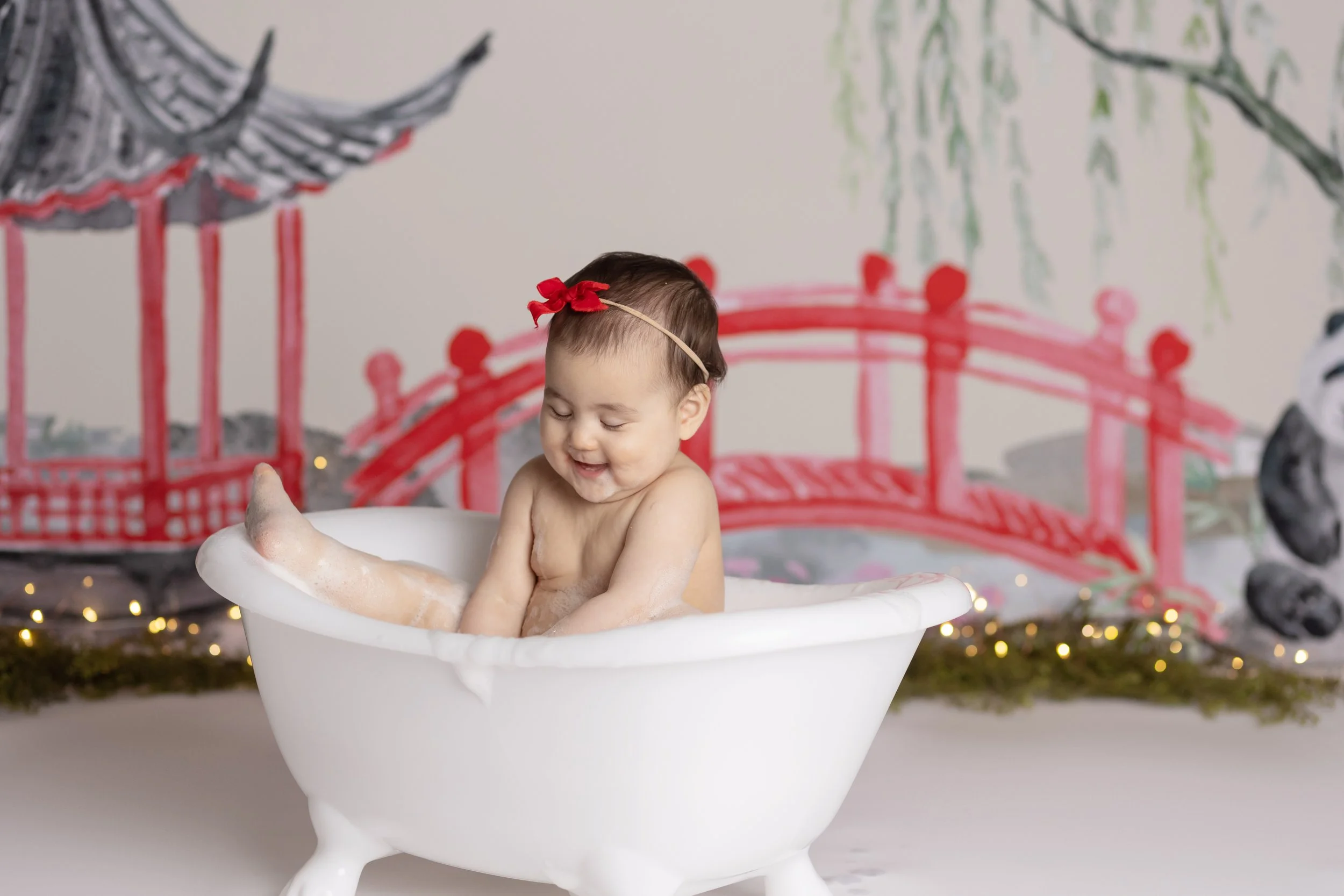Cake smash bath photo – Chinese-inspired theme first birthday session