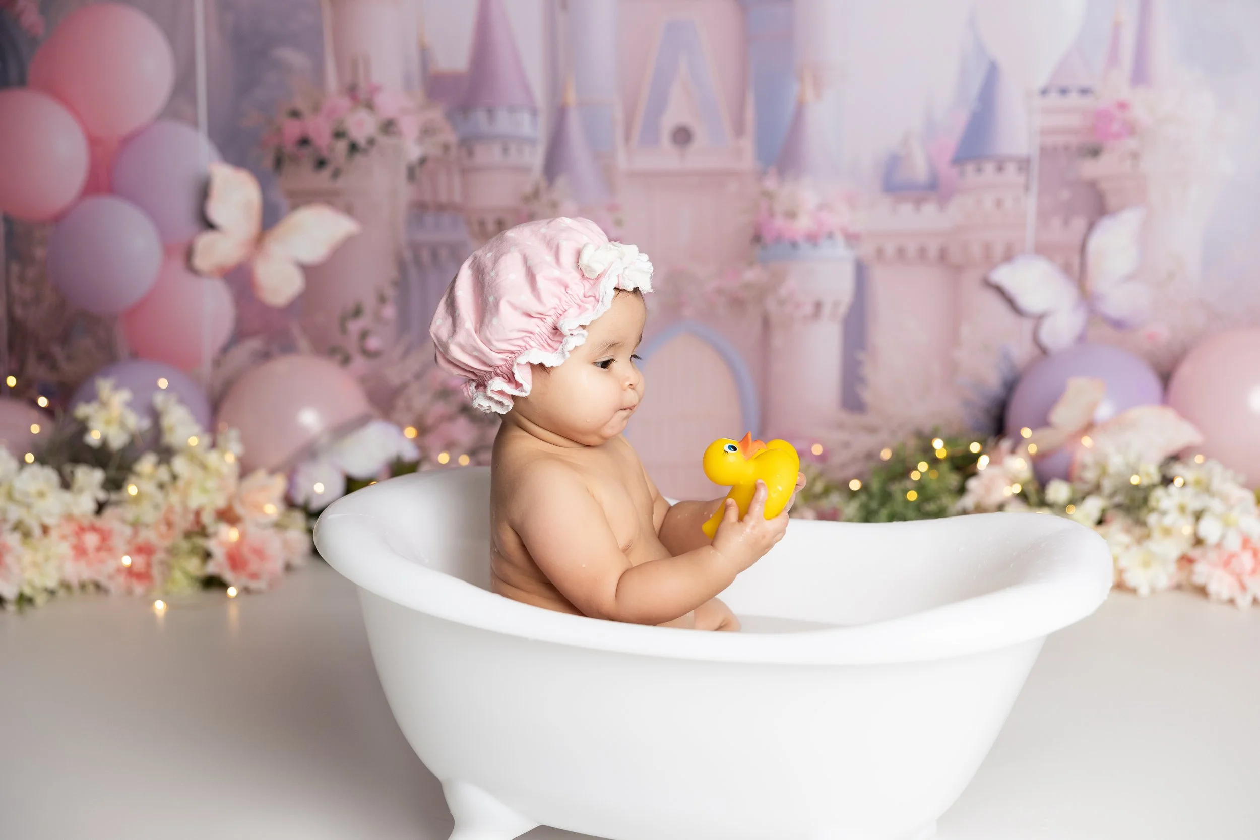Cake smash bath photo – princess castle theme first birthday girl