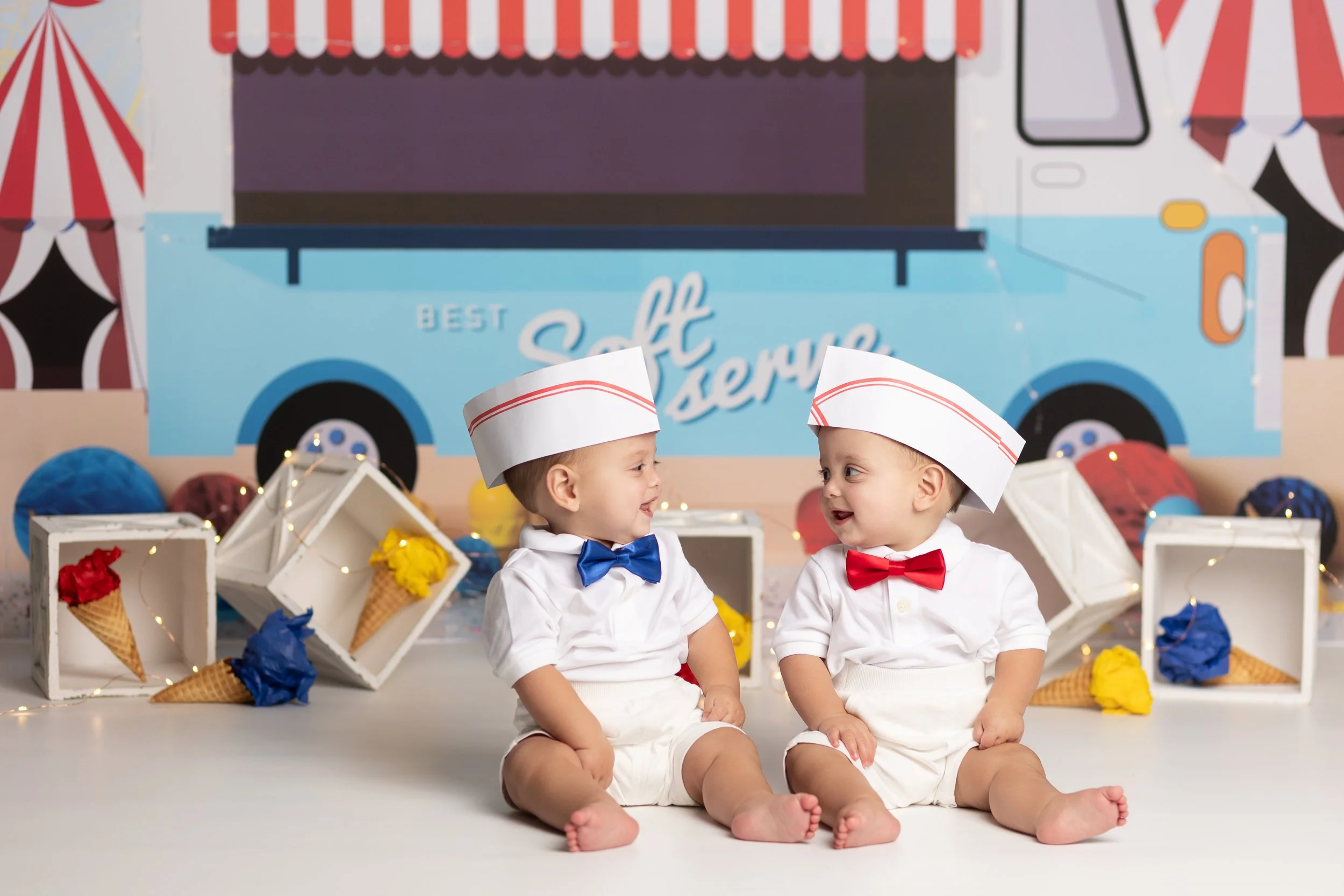 Ice cream cake smash theme – twins first birthday portrait with ice cream truck setup