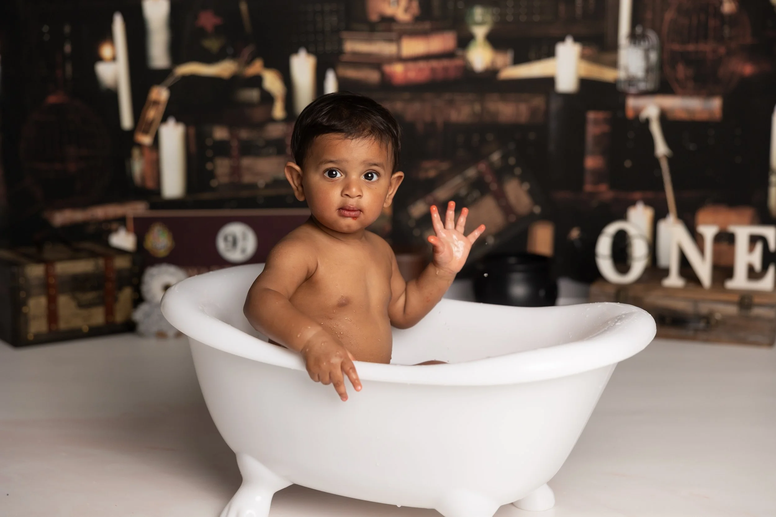 Cake smash bath photo – Harry Potter theme first birthday session