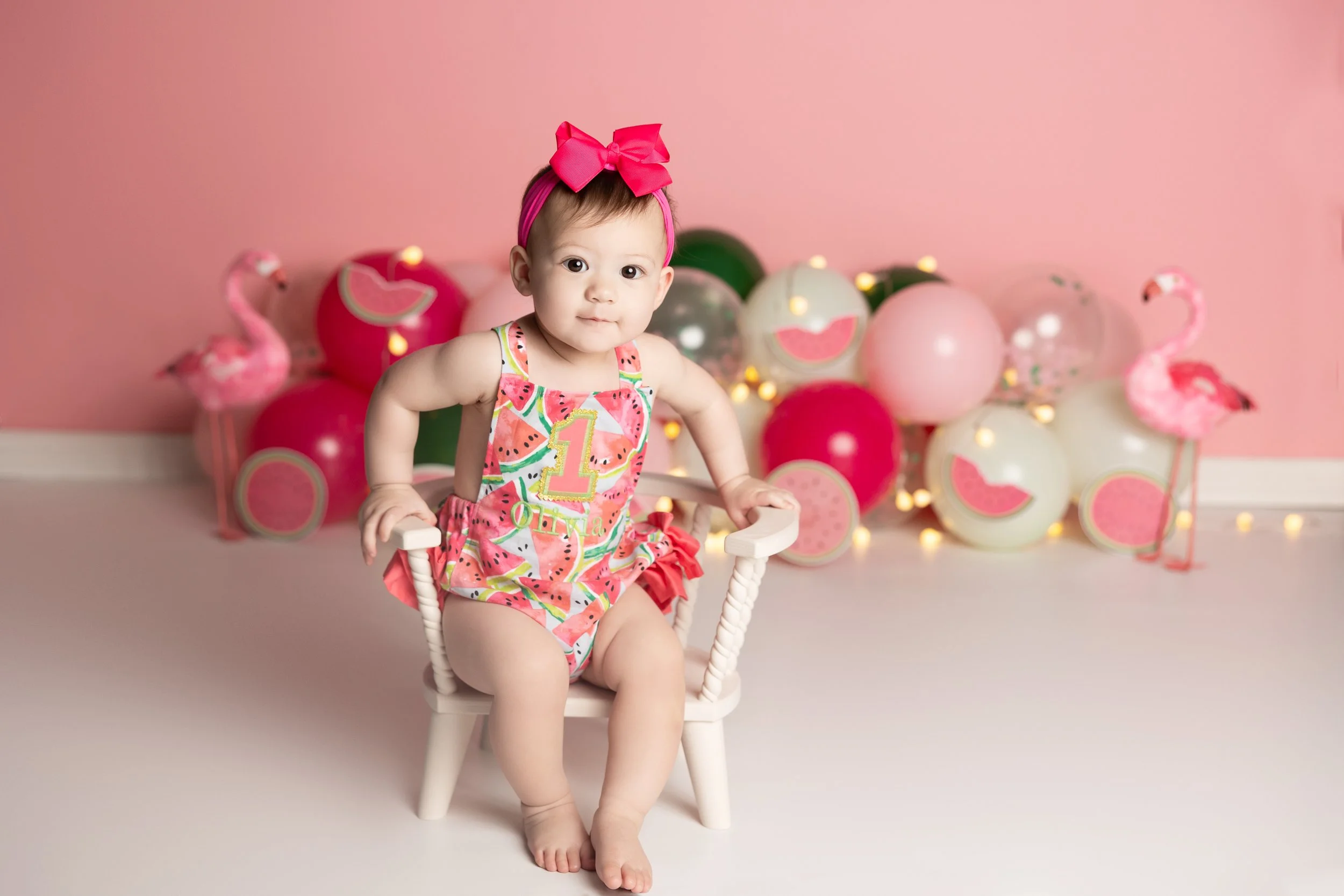 Watermelon cake smash theme – first birthday girl portrait with summer setup