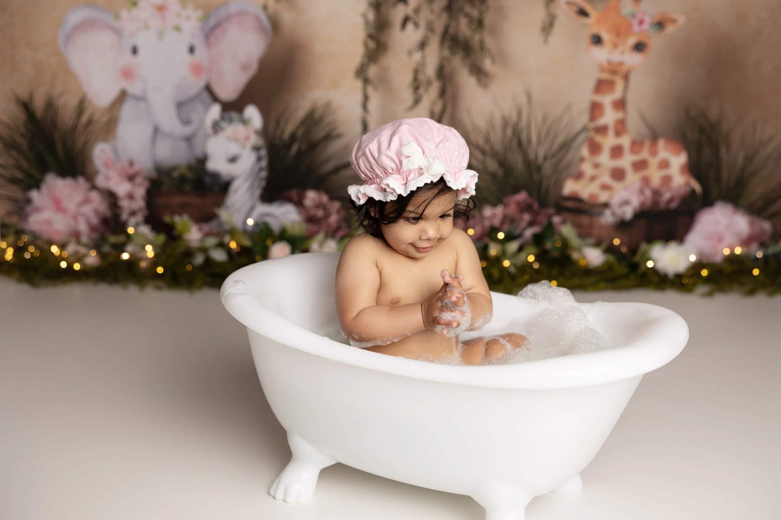 Cake smash bath photo – girl safari theme first birthday session