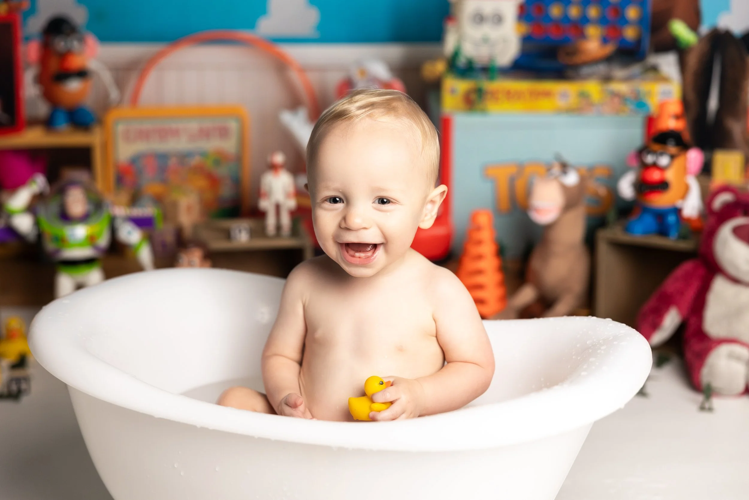 Cake smash bath photo – Toy Story theme first birthday session
