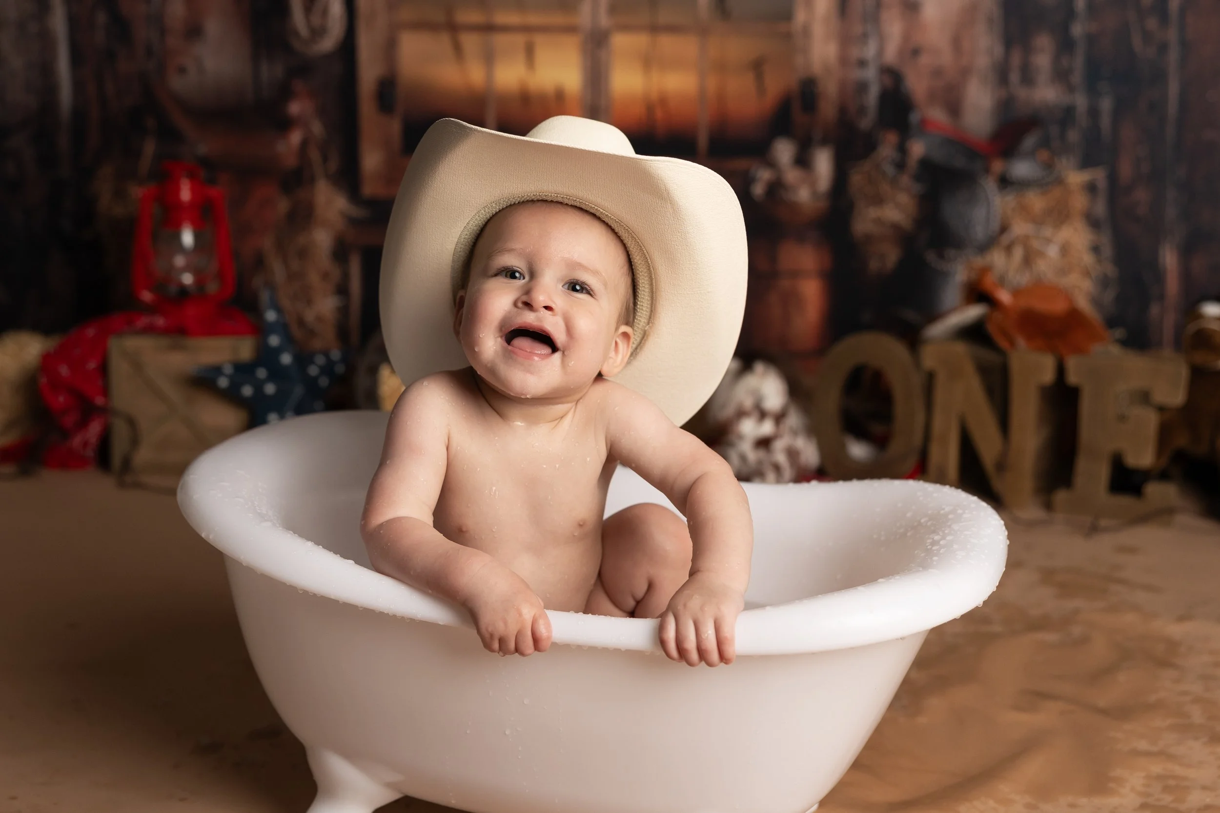 Cake smash bath photo – cowboy theme first birthday session