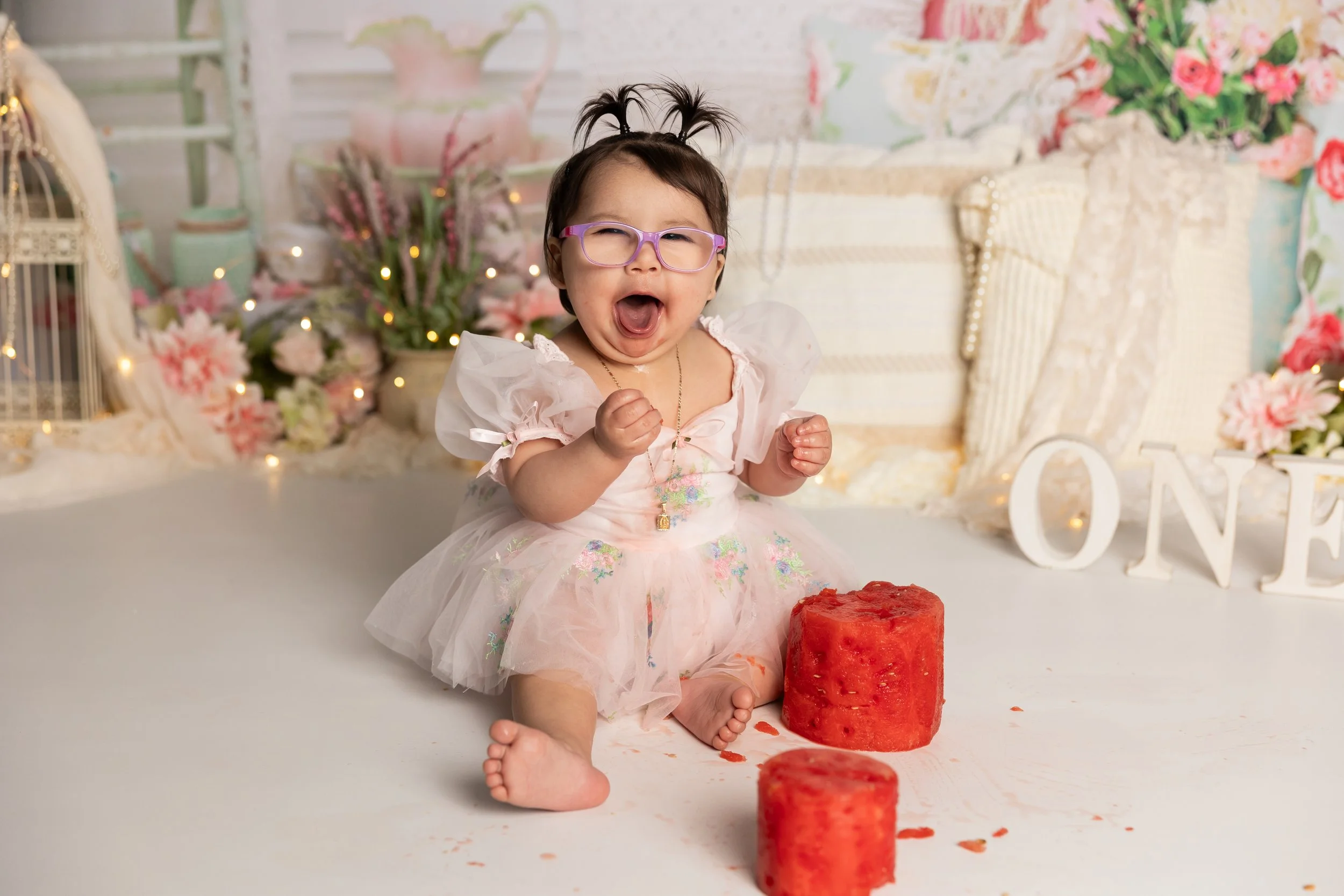 Happy baby after watermelon smash first birthday session Austin