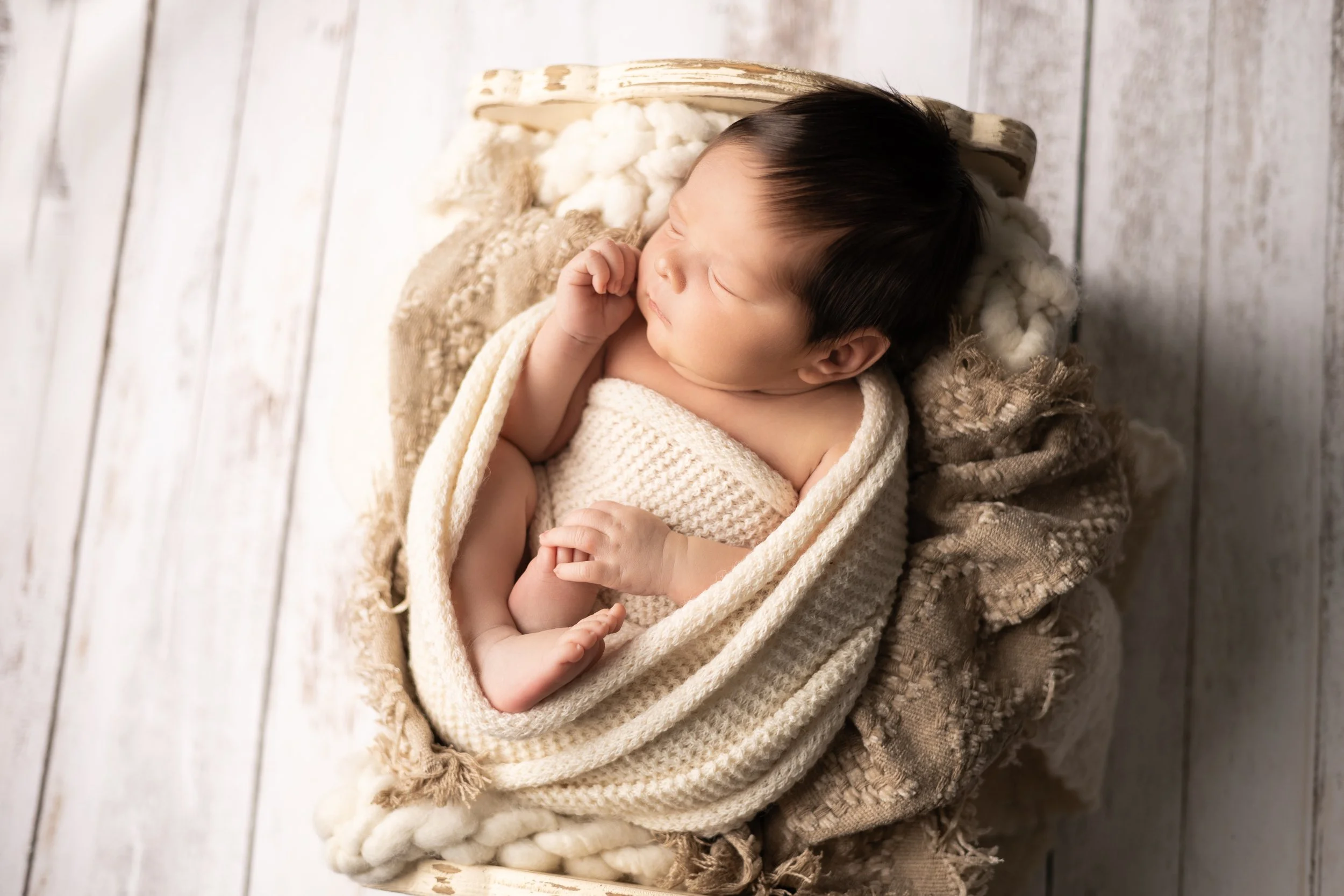 Wrapped Newborn Boy in Soft Neutral Tones