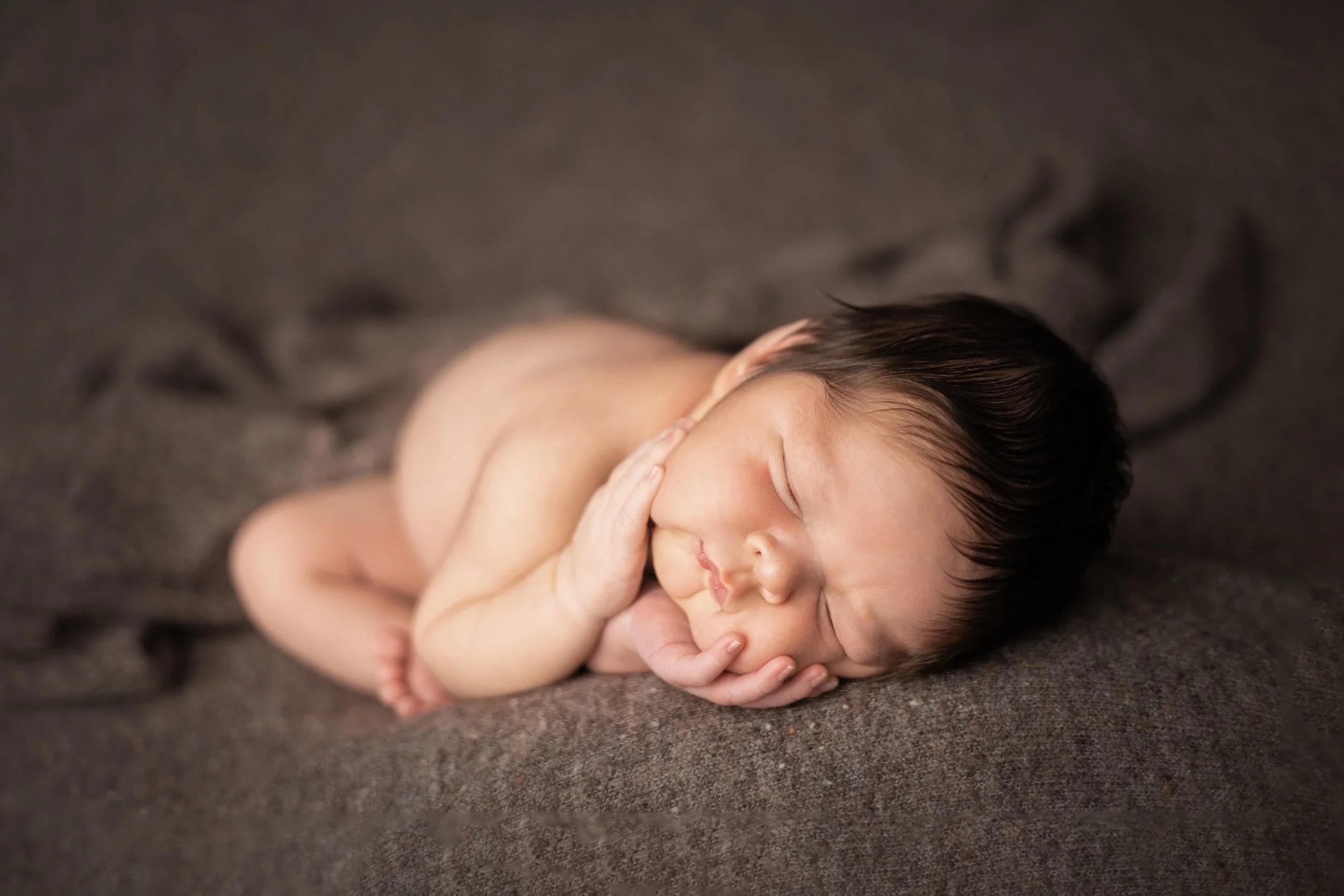 Peaceful Sleeping Newborn Baby Boy Close Up