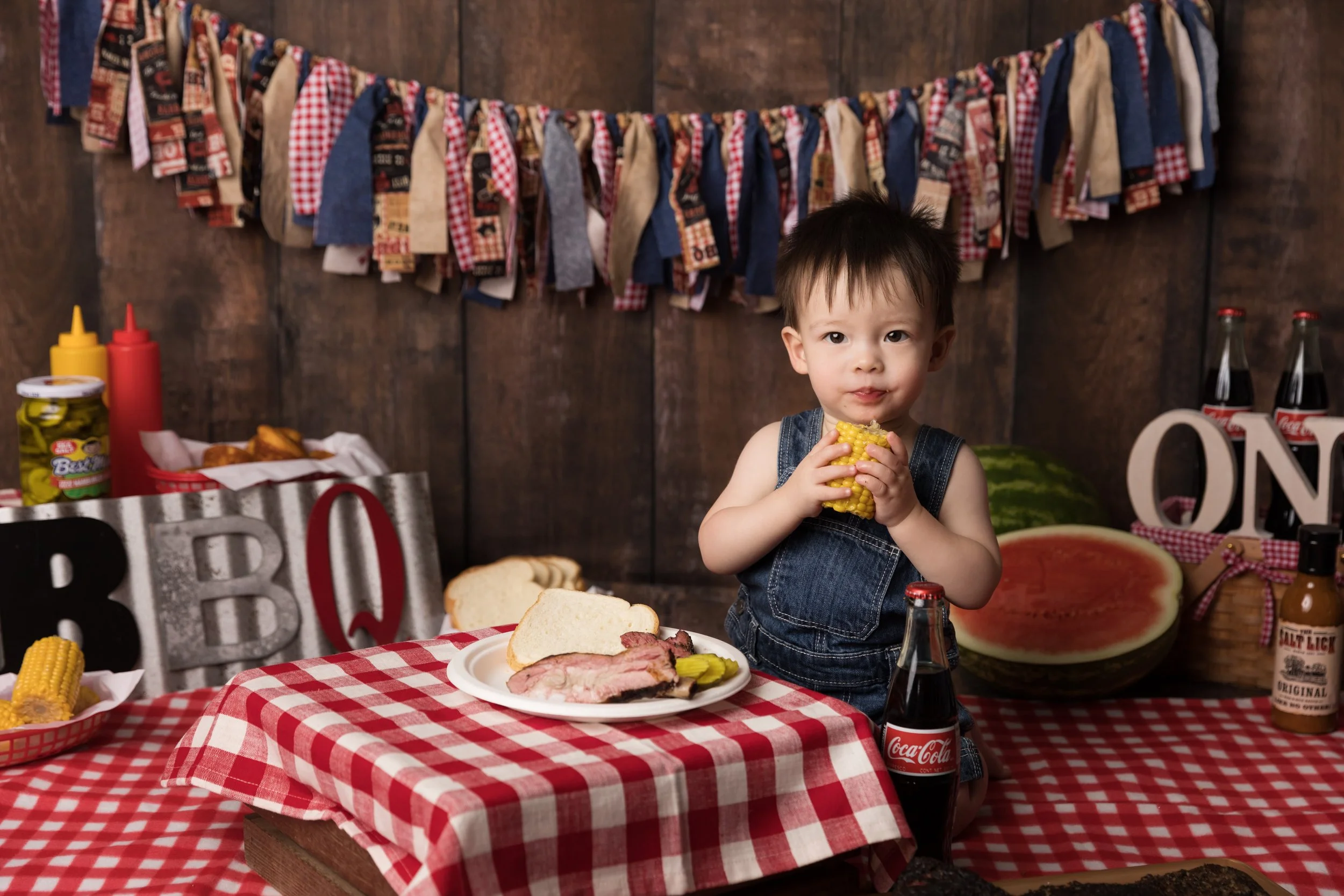 Baby Boy Eating Cornbread During BBQ Smash