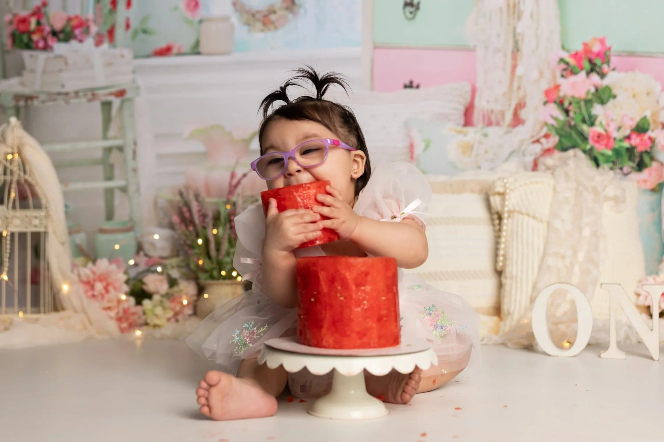 Baby Girl Eating Watermelon During First Birthday Session