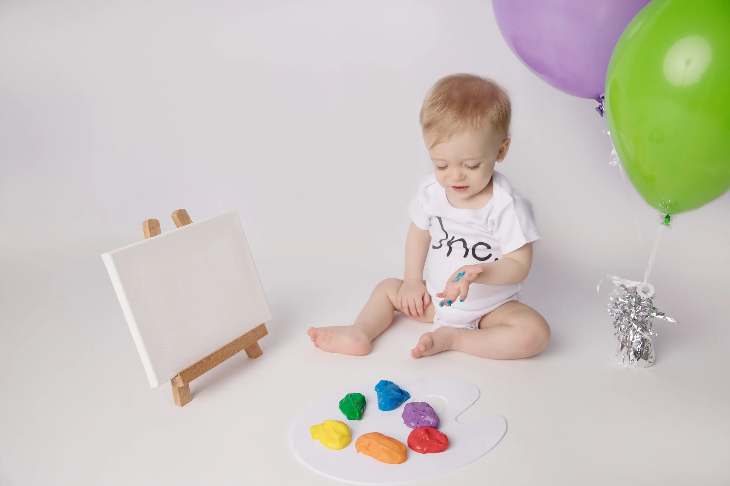 Colorful Yogurt Finger Painting First Birthday Session