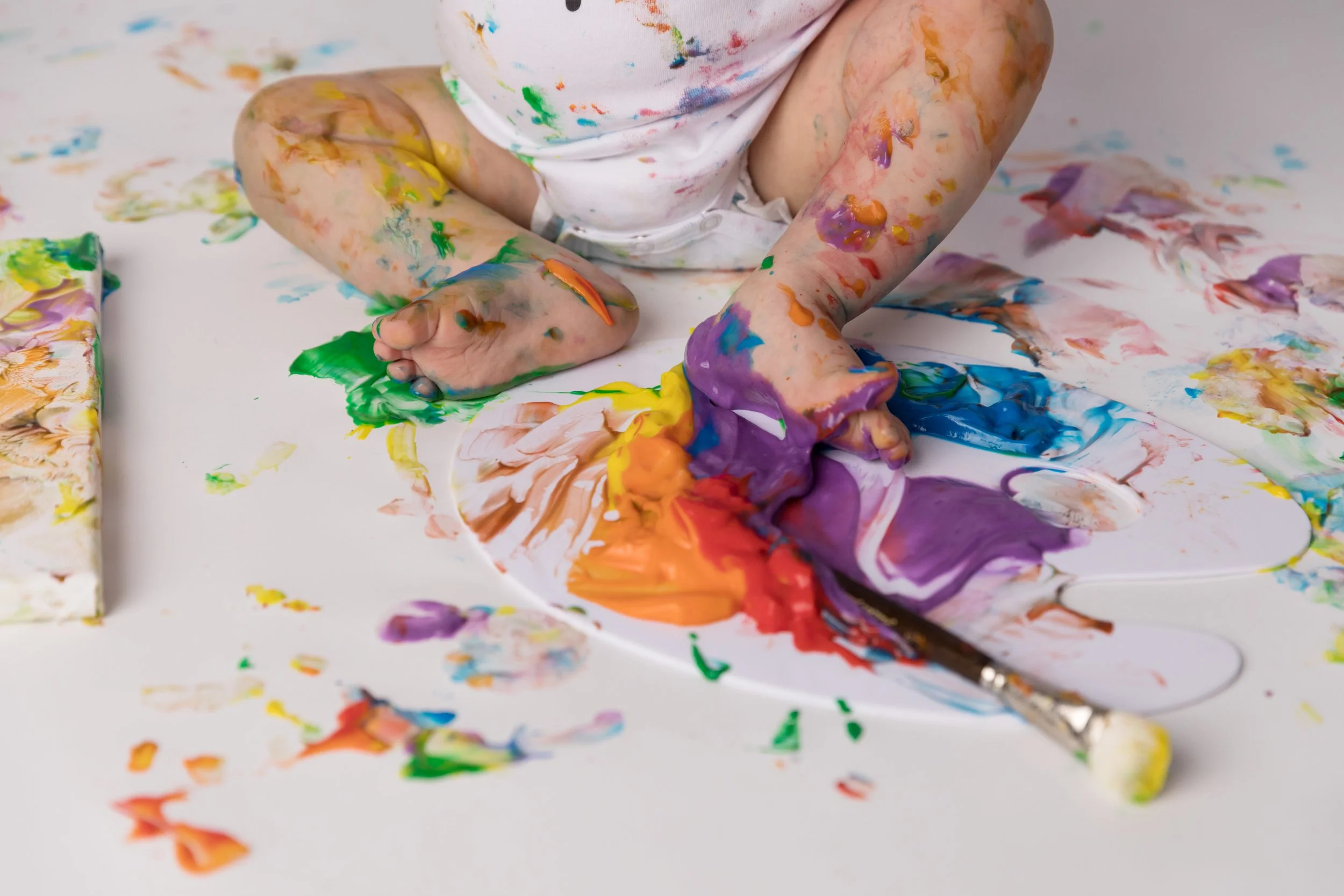Messy Finger Painting Closeup During Baby Milestone Session