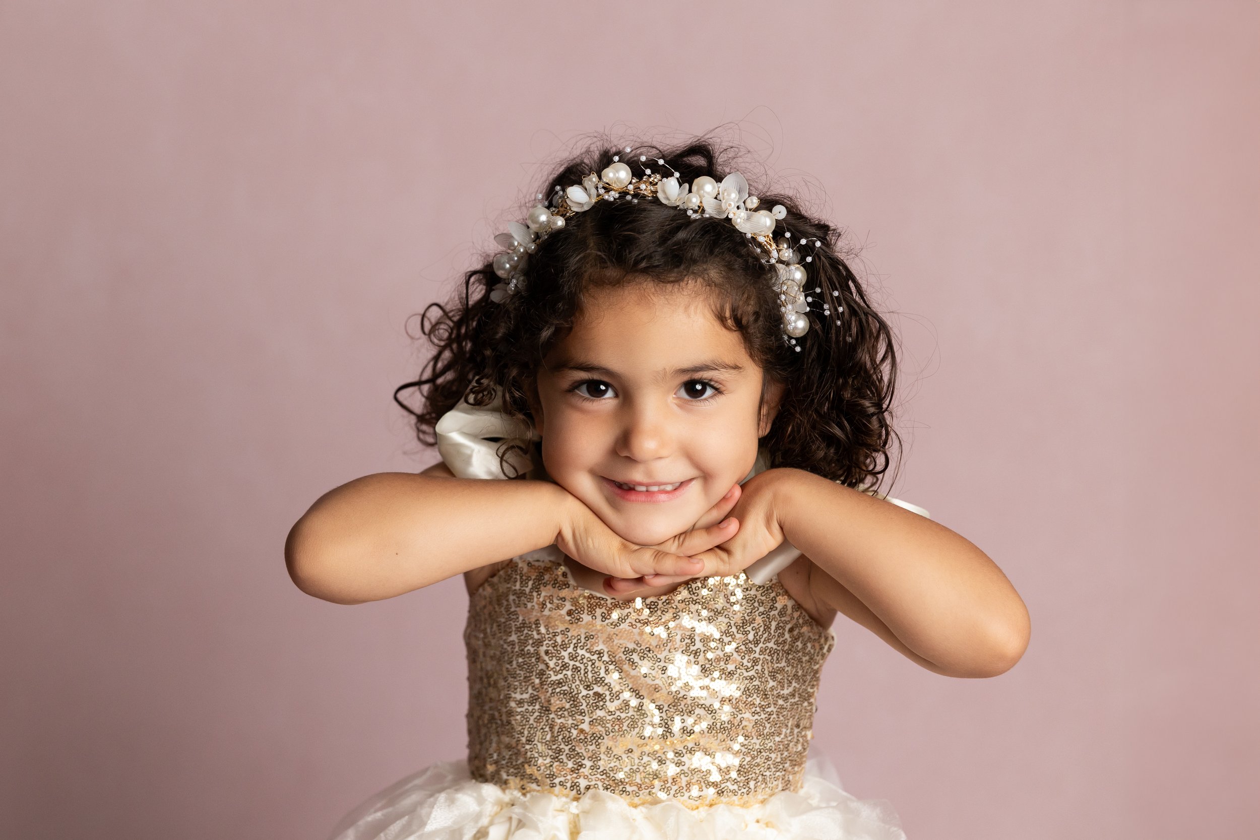 Little Girl in Gold Dress with Glitter Princess Vibes