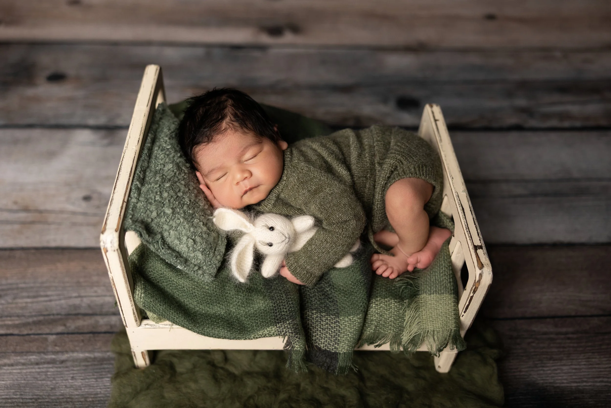 Olive Green Newborn Bed Portrait with Lovie