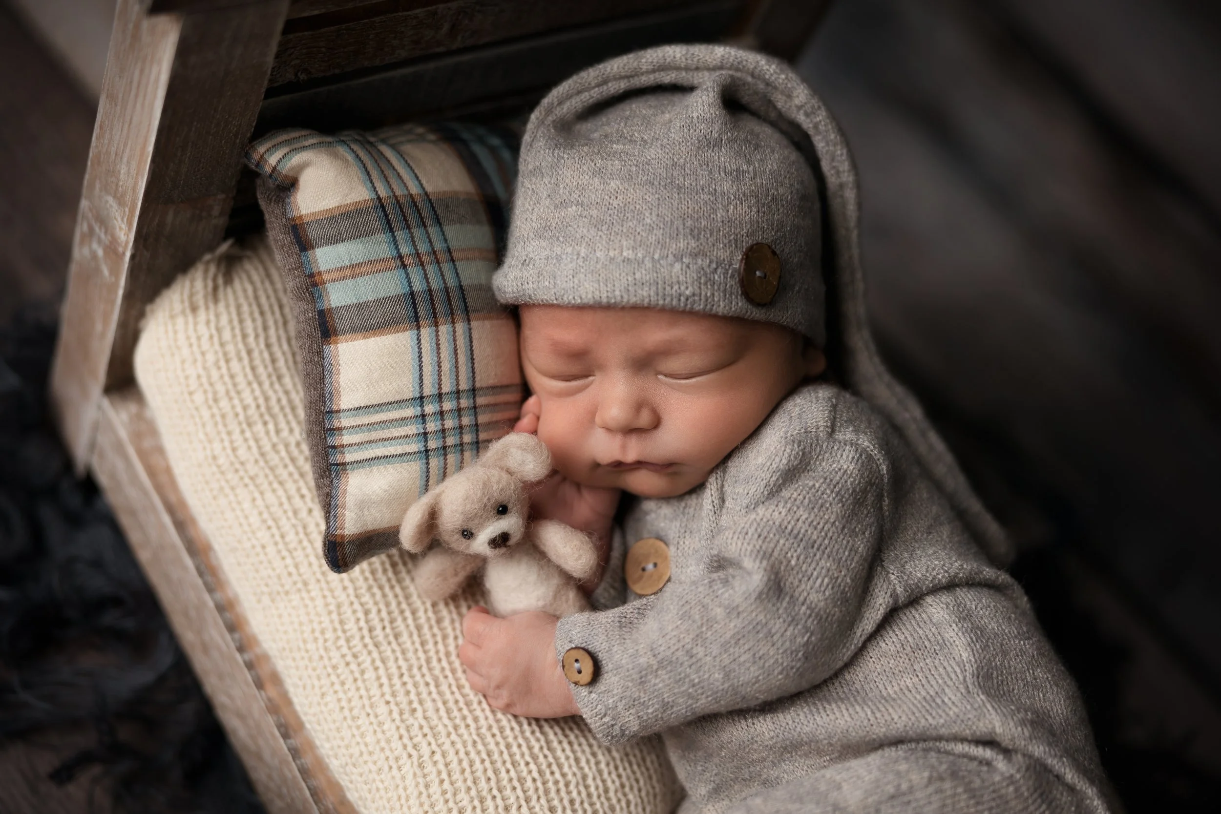 Cozy Newborn Bed Close-Up with Teddy Bear