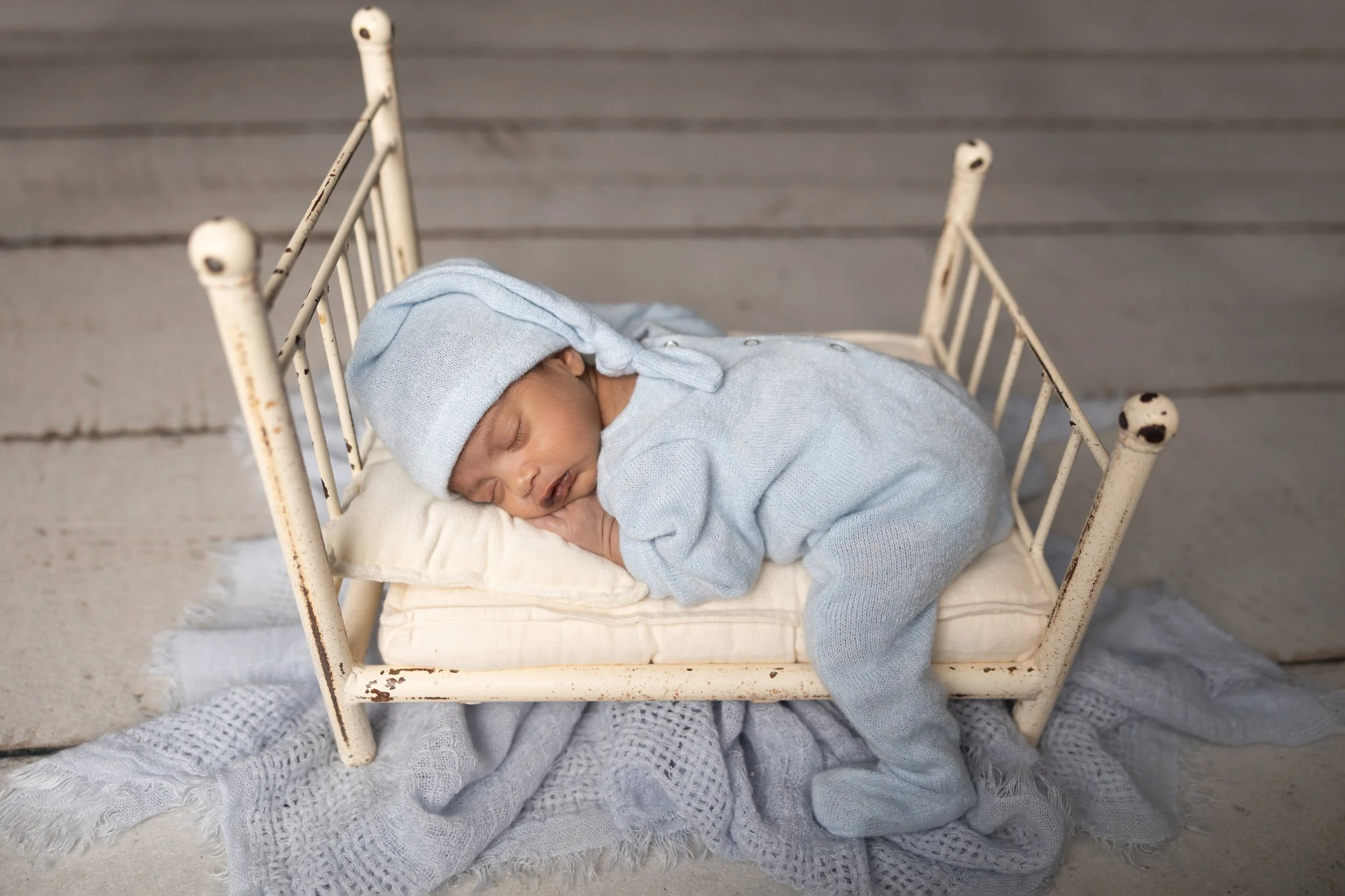 Soft Blue Newborn Bed Pose
