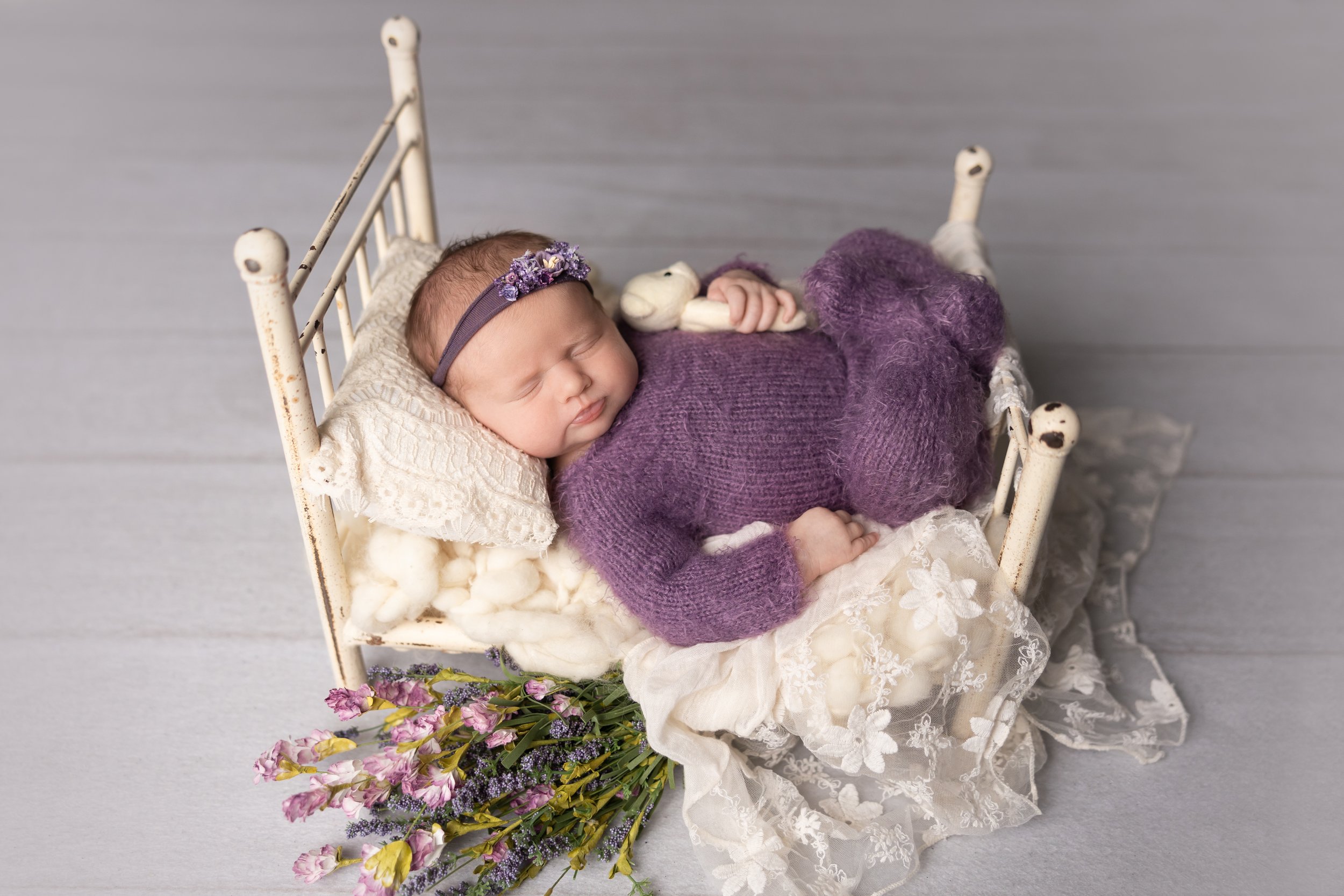 Purple Knit Newborn Bed Portrait