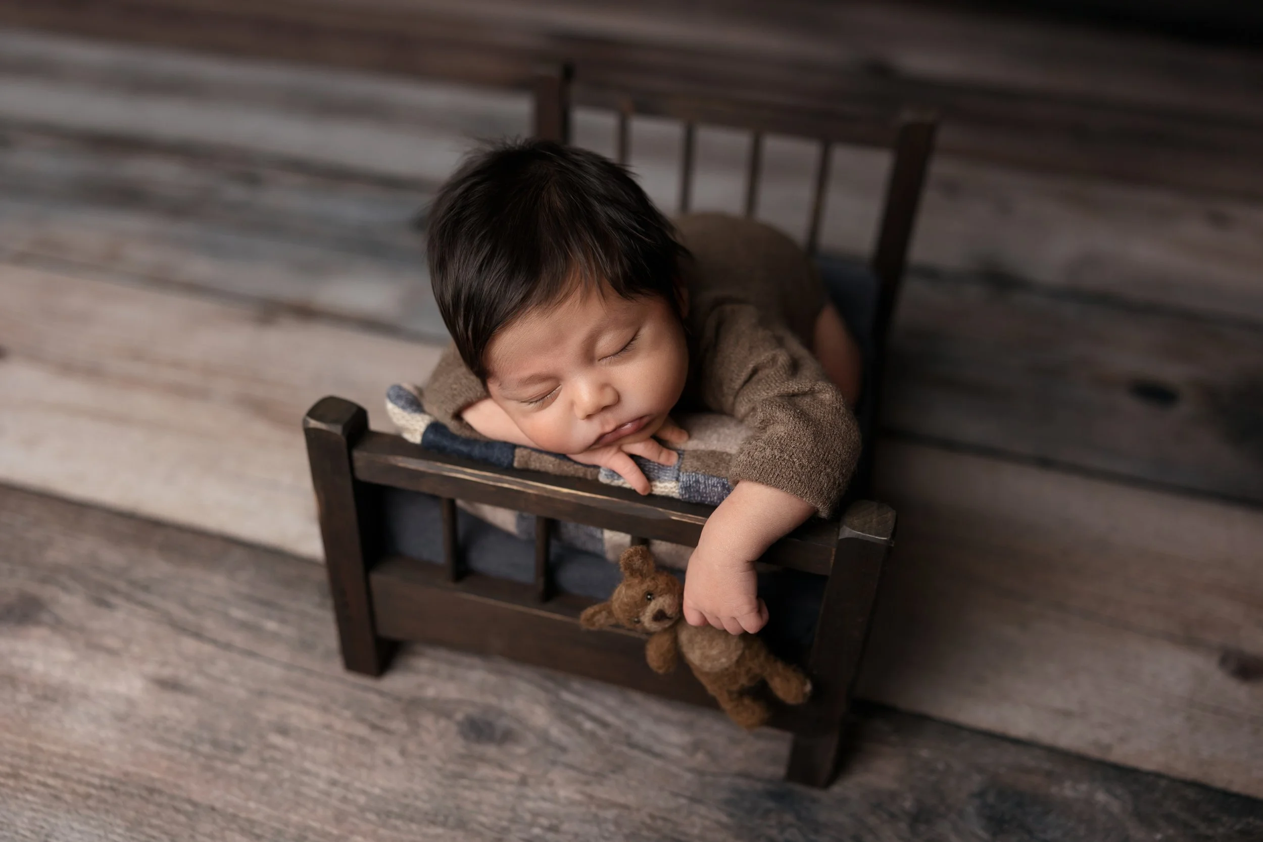 7 Newborn Bed Prop Poses Every Photographer Should Know