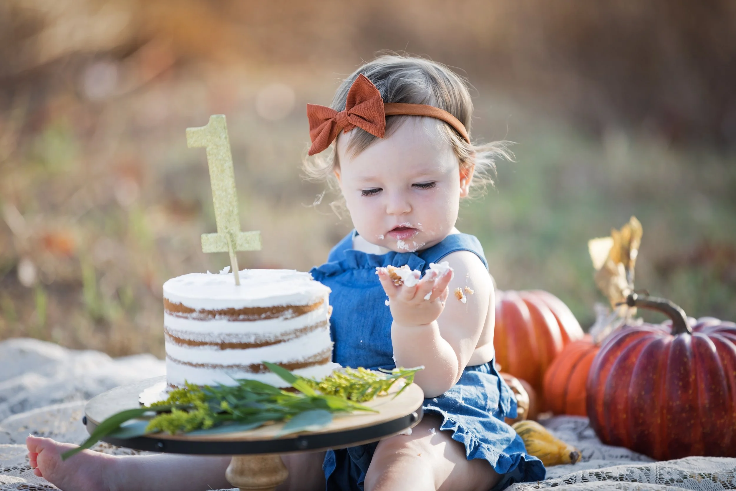 one-year-old-eating-cake-outdoor-cake-smash-austin.jpg