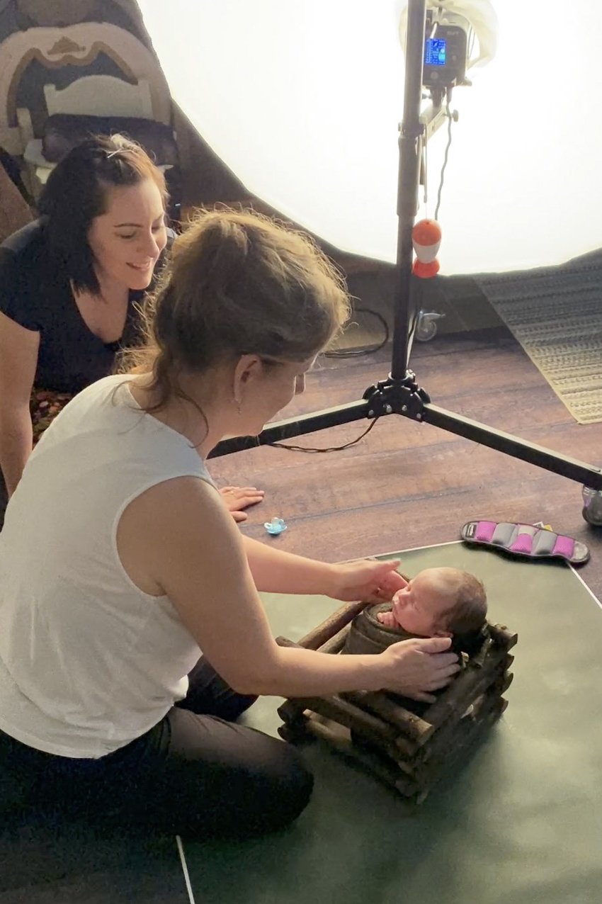 Newborn photography mentoring session in Austin TX with hands-on posing and lighting guidance