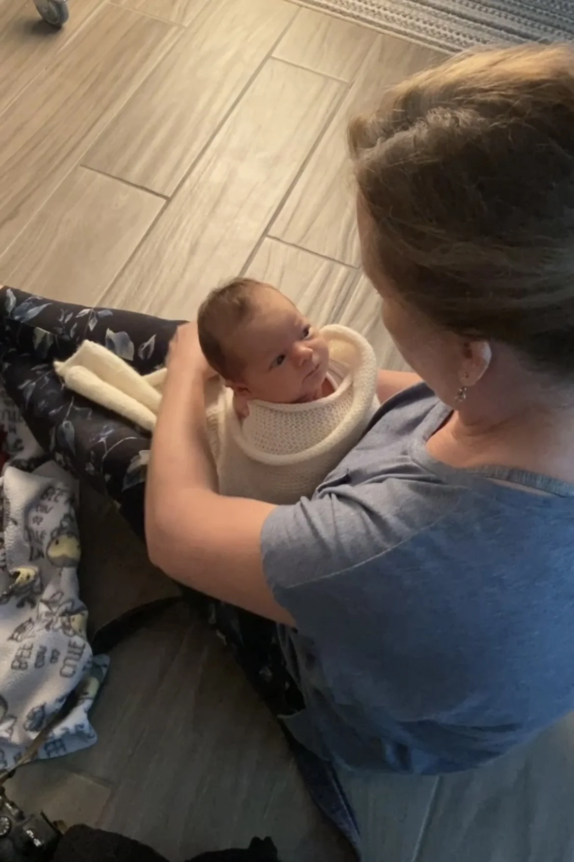 Behind the scenes of a newborn photography mentoring session in a professional studio