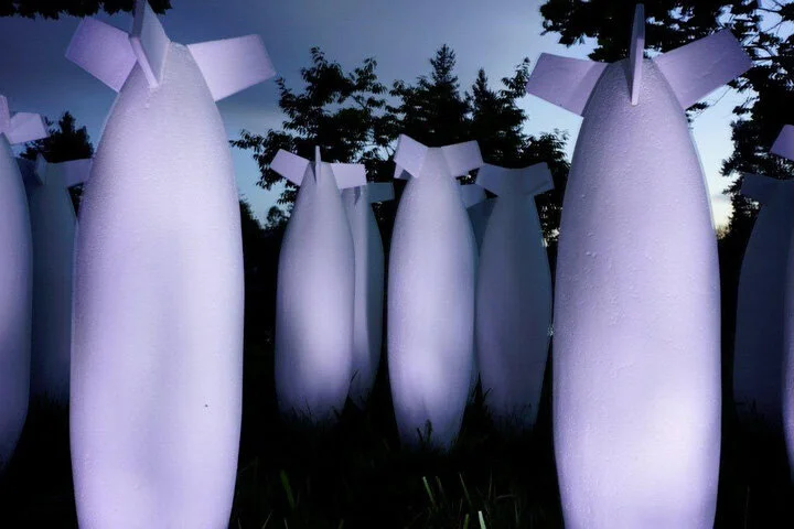 W.O.M.D II -Target (2012 ) -(site specific) Utopia into Dystopia -1000mmh x 300mmdia -16 sculptures, HD polystyrene and concrete base; Waitakaruru Sculpture Park, NZ