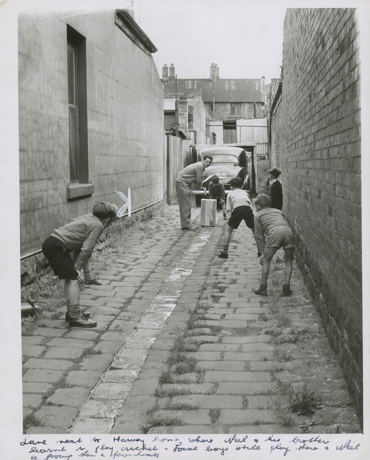 Lane next to Harvey's home where Neil and his brothers learned to play cricket 1950