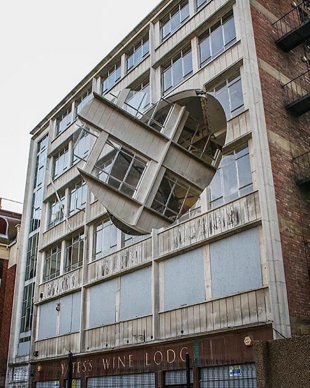 &lsquo;Turning the Place Over&rsquo; (2008) by sculptor Richard Wilson RA, a 10-metre section of the facade of a disused building in Liverpool, cut free and rotated.
.
Couldn&rsquo;t be happier that Bow Gamelan Ensemble, founded by Richard Wilson, An