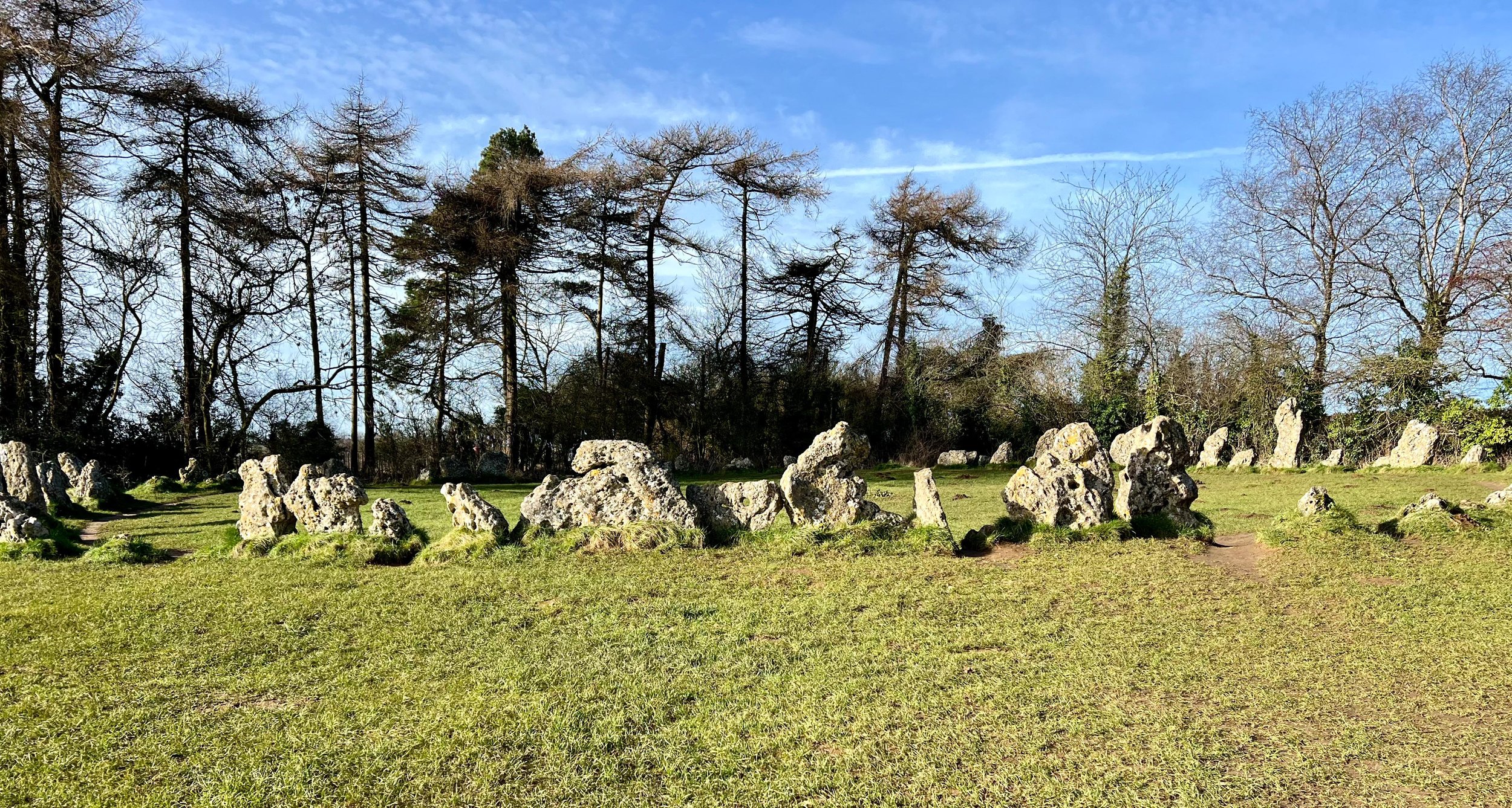 Stone circle with trees and blue sky