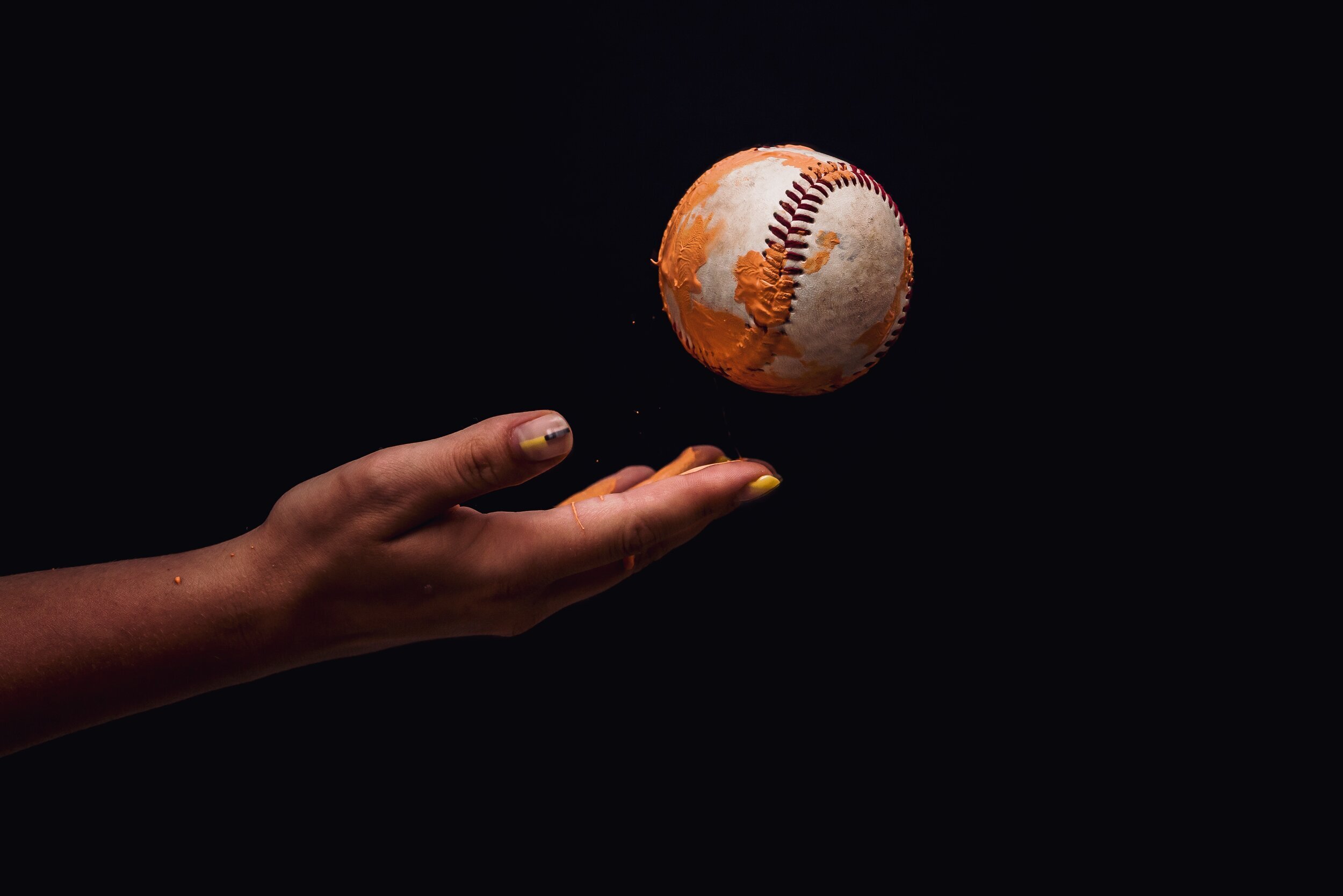 photo-of-person-s-hand-throwing-a-baseball-2694317.jpg