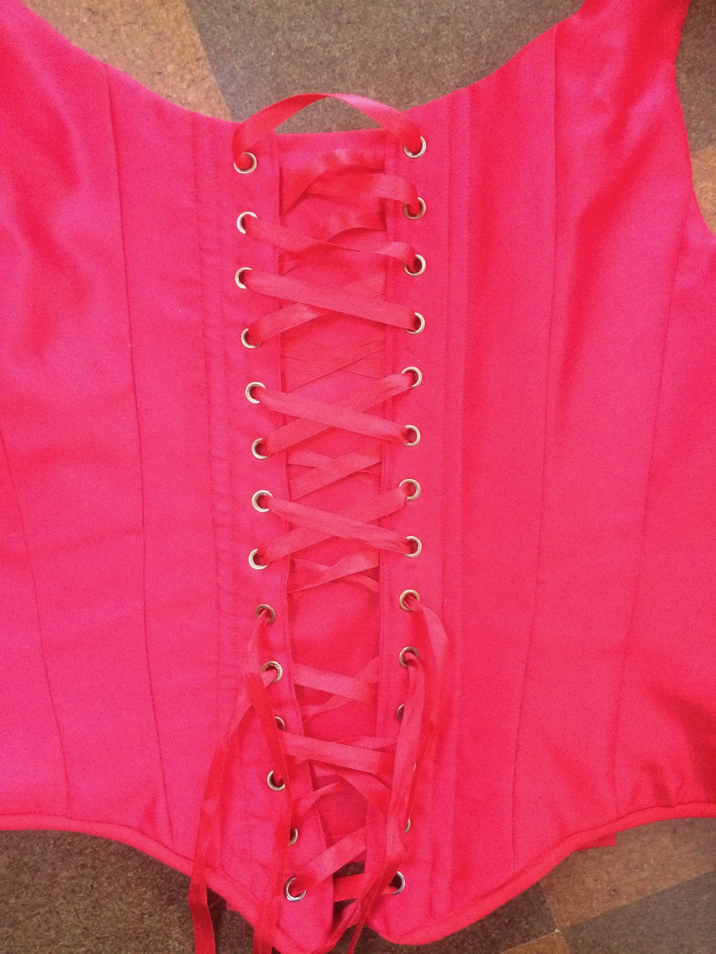 Bodice lying flat showing lacing