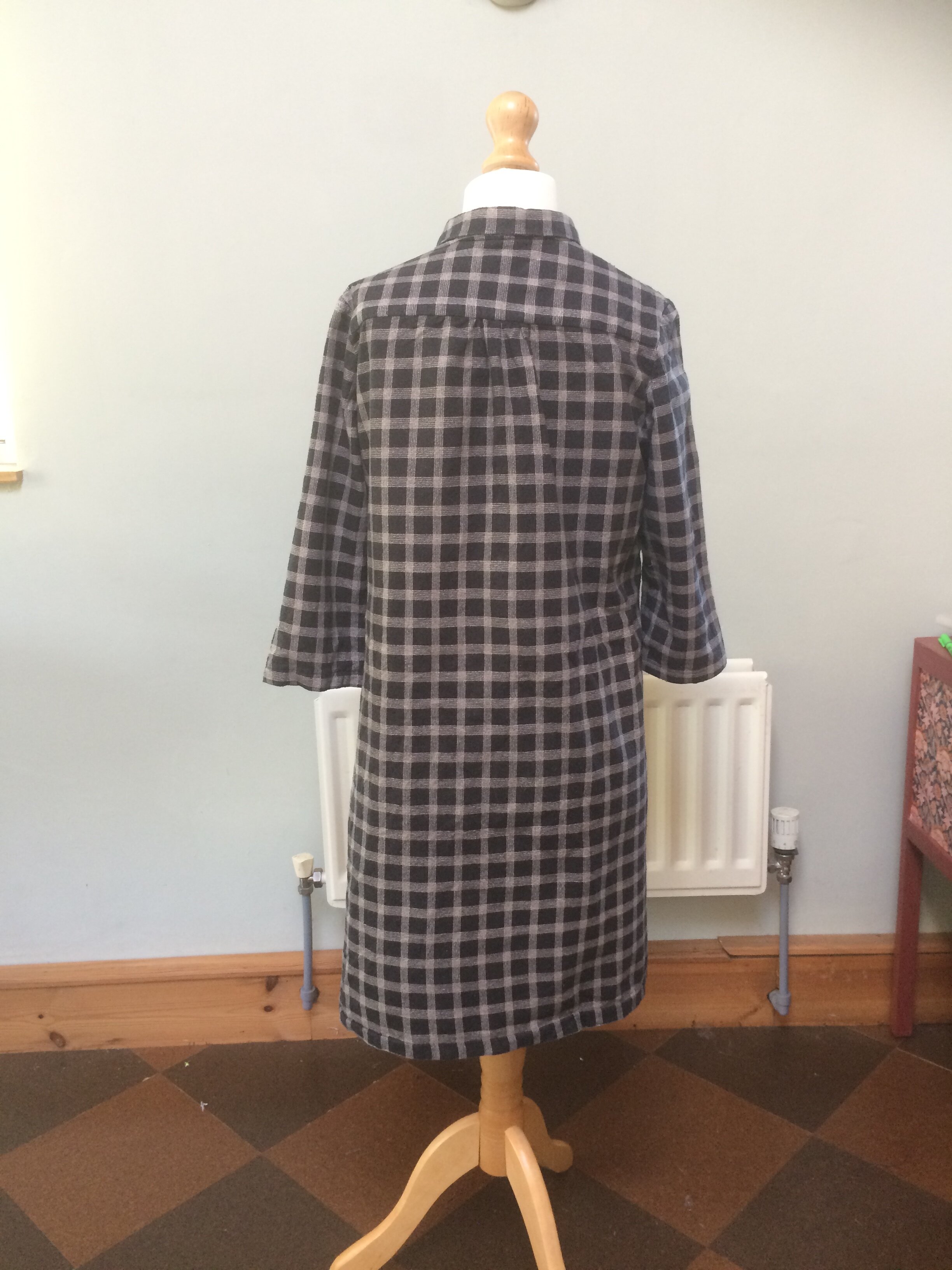 Completed shirt dress on dummy (back view)