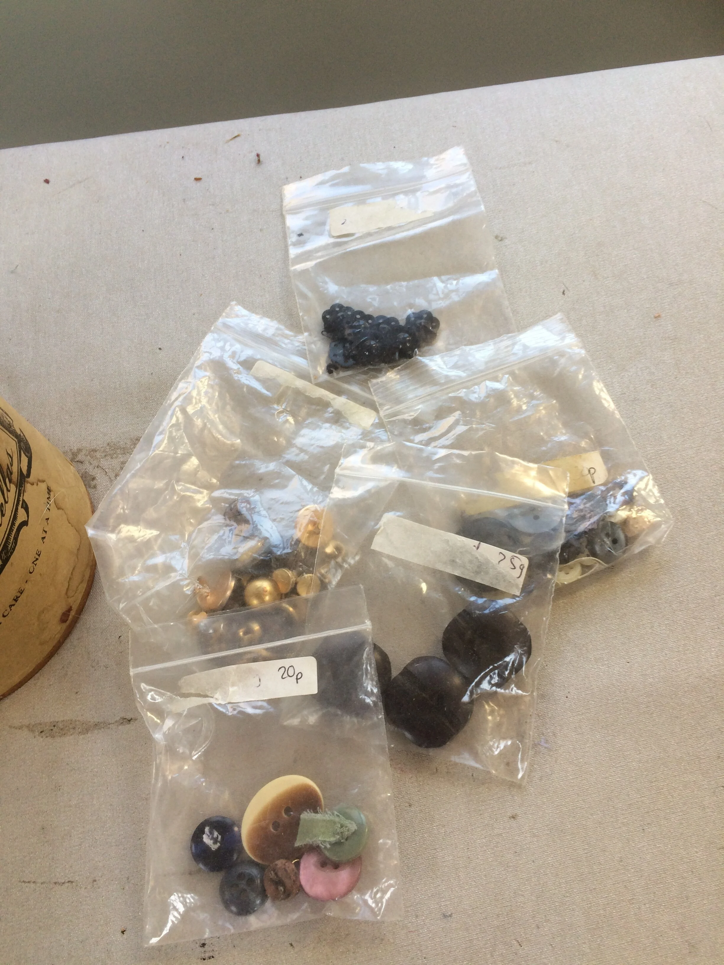 buttons in packets.jpeg