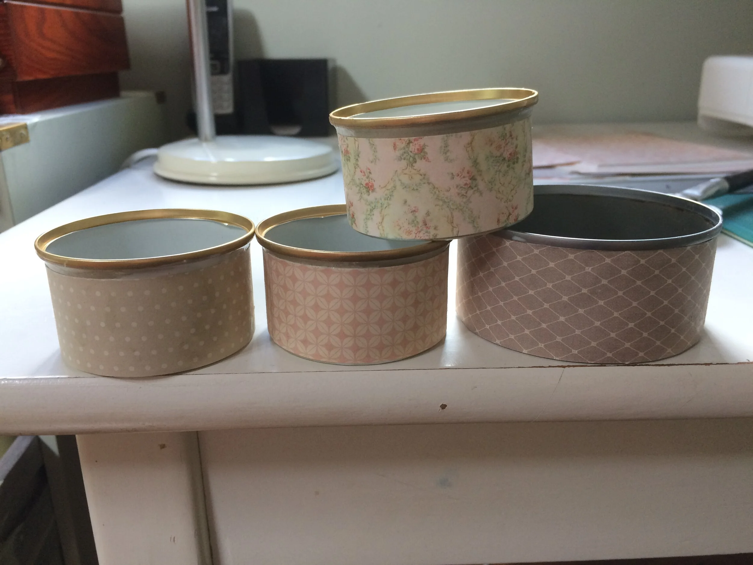 Cans with paper stuck to them