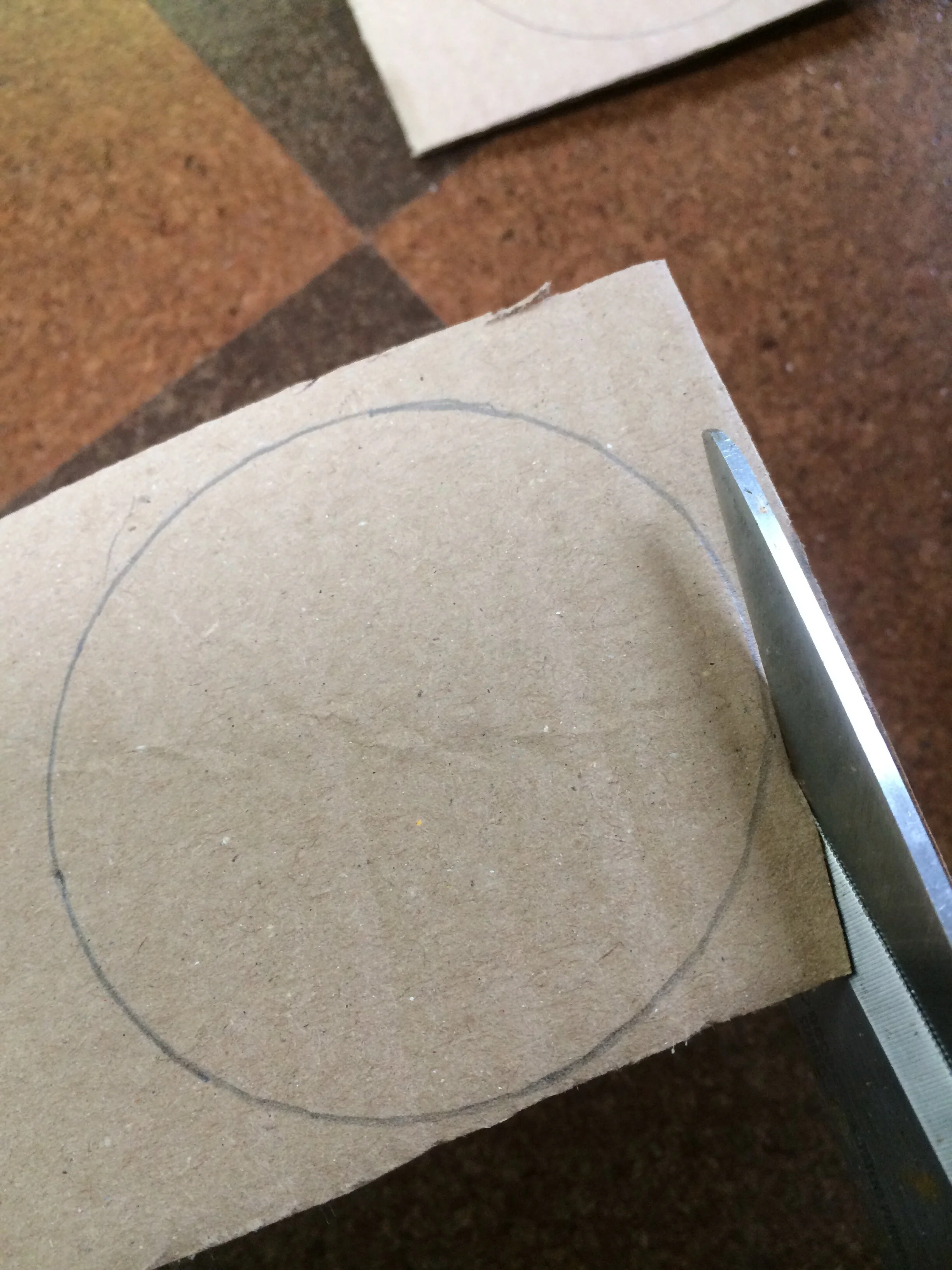 Cutting out cardboard lid