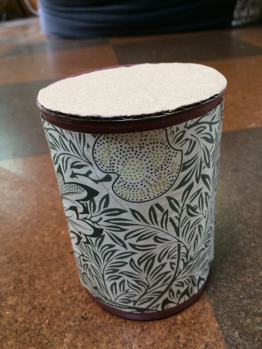 Can with smaller cardboard lid
