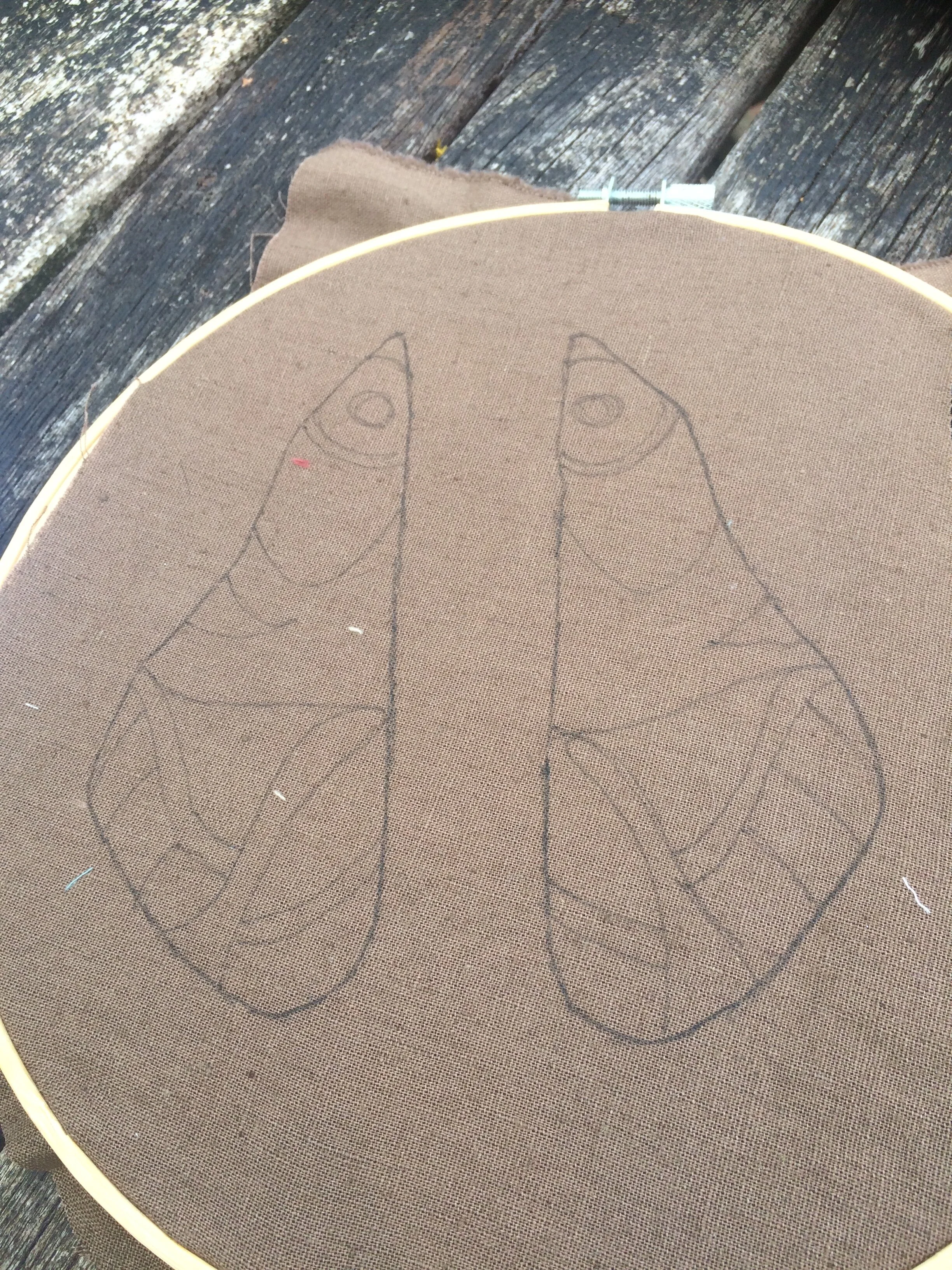 Wings drawn on fabric