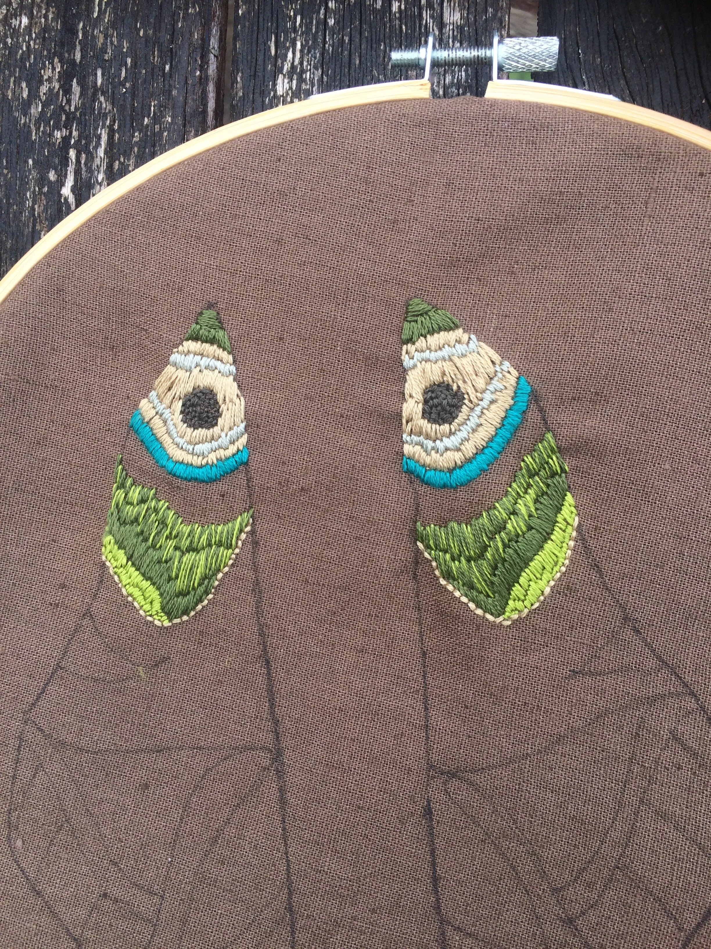 Partially embroidered wings 