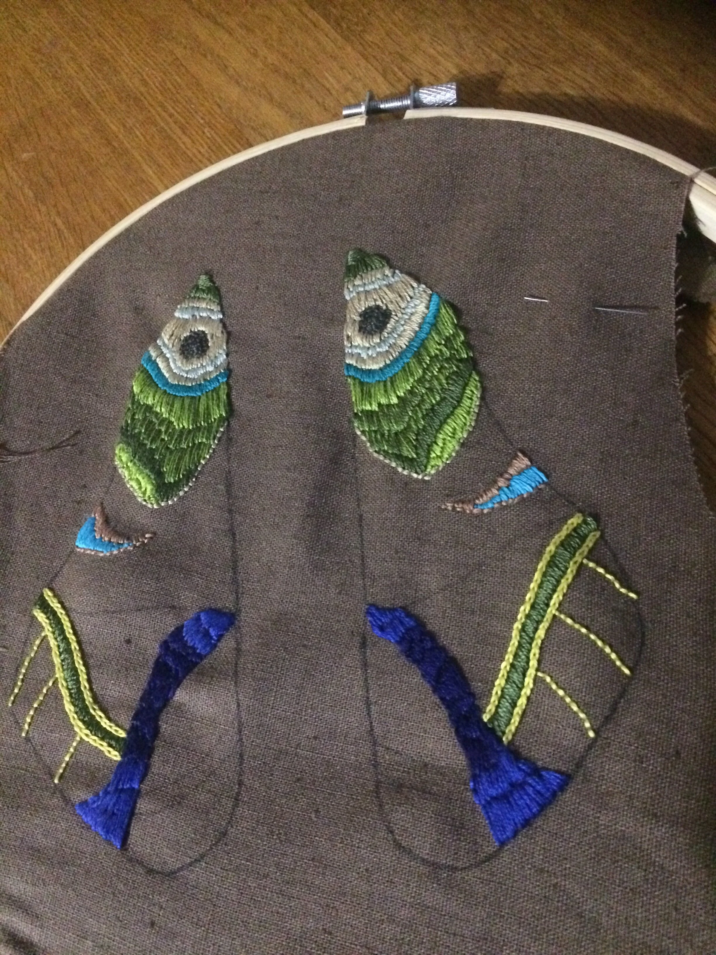 Partially embroidered wings 