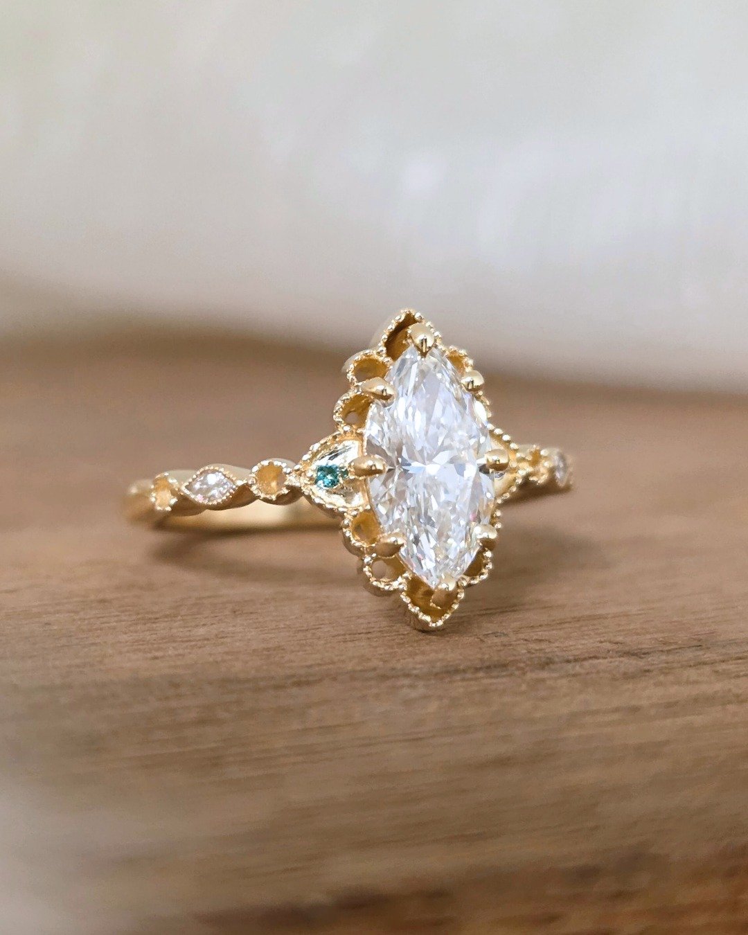 Our client came to us with reference photos of delicate, lace-like rings and two requests: she needed her forever ring to sit low for her very hands-on career, and it had to beautifully balance the sentimental right-hand ring she wears every day.

We