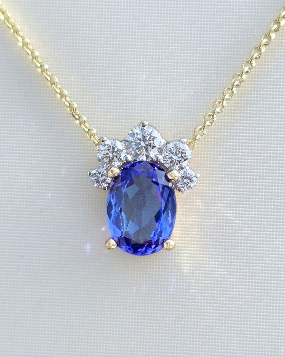 After summiting Mount Kilimanjaro, this client wanted more than a photograph to remember their journey. She brought us a vivid oval tanzanite, chosen to celebrate the climb, and trusted us to help transform it into something she could carry with her 