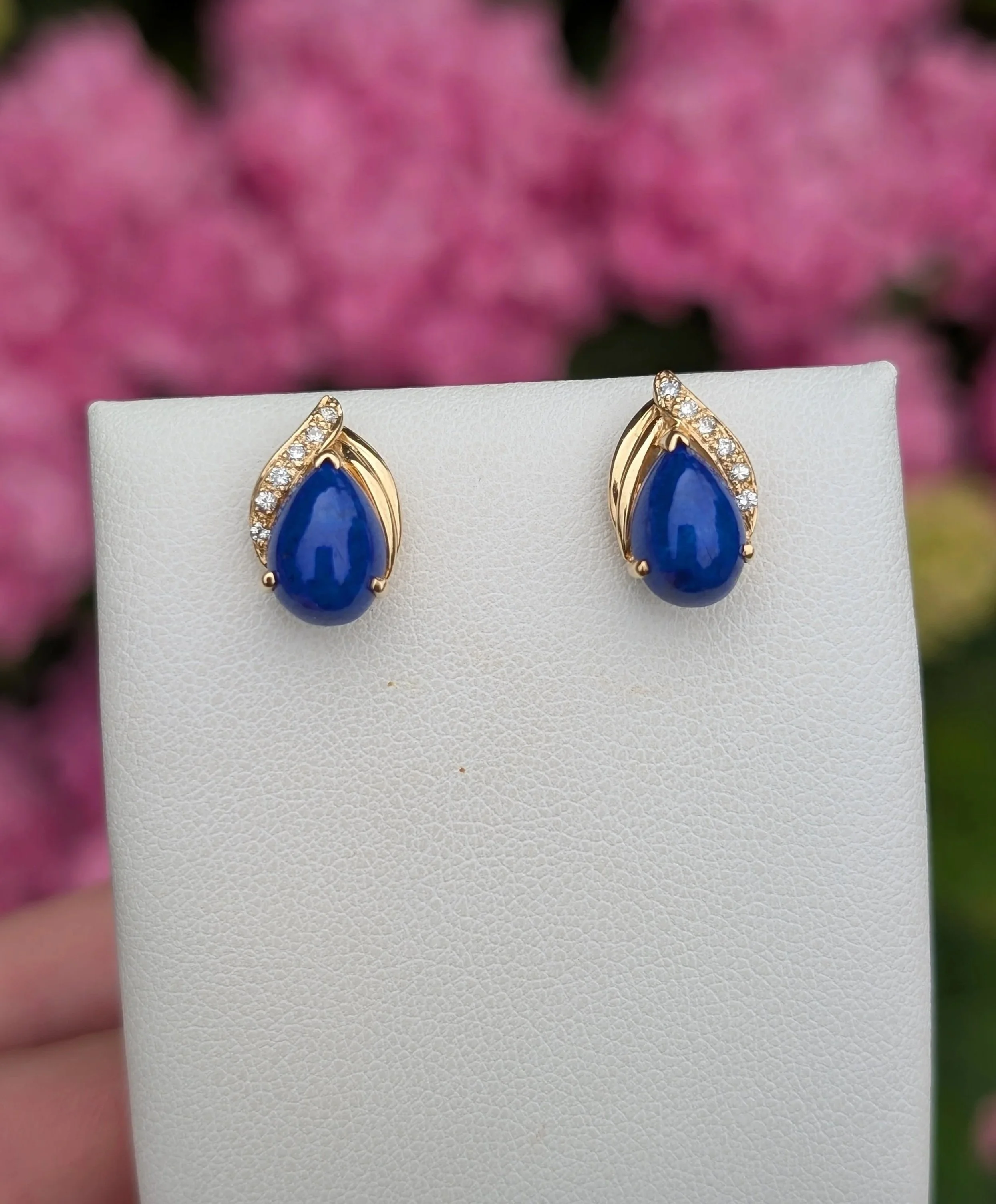 14k yellow gold lapis and diamond stud earrings with post and clutches. (210-3739)