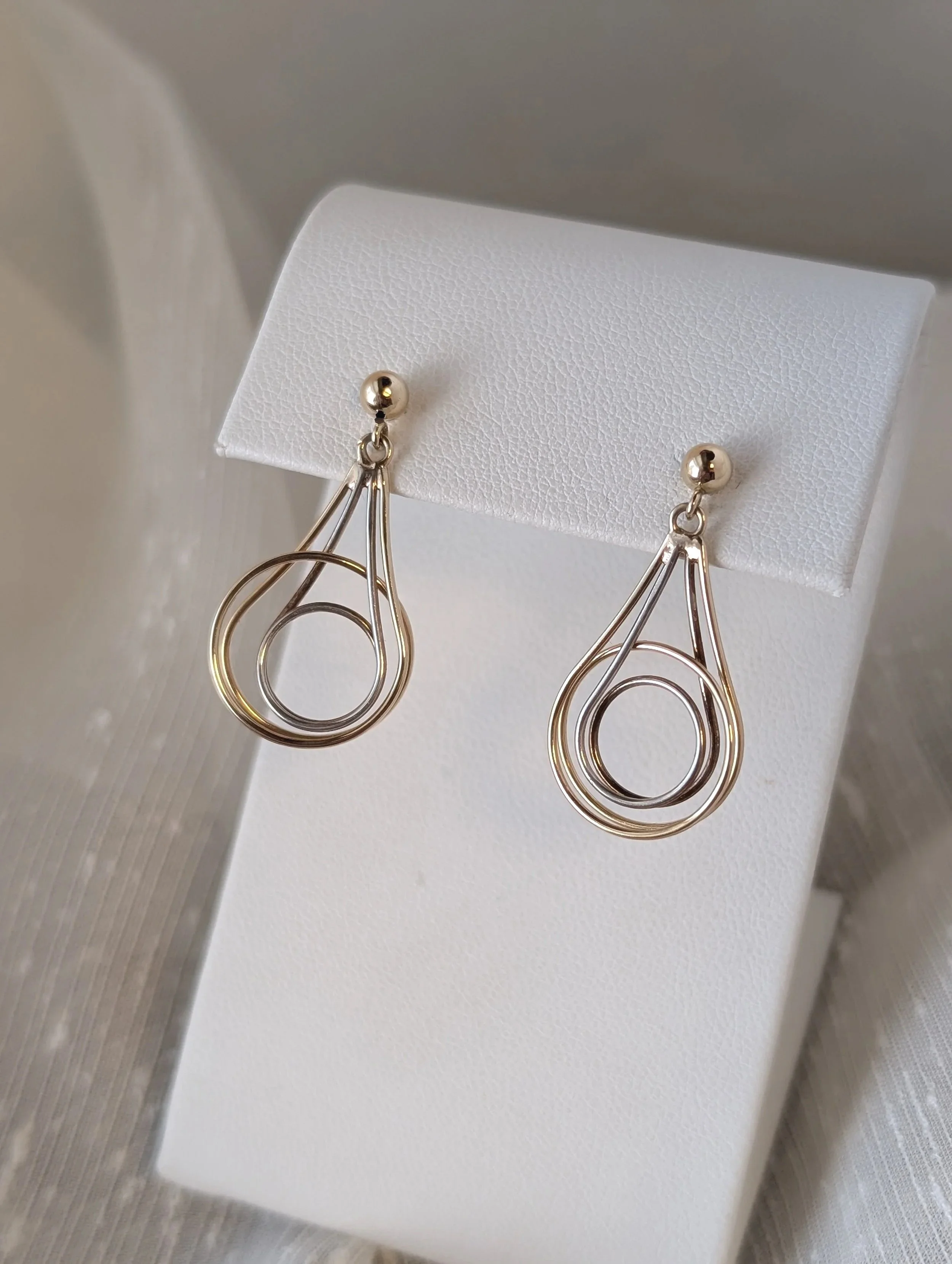14k two-tone dangle earrings with post and clutch closures. (425-5735)