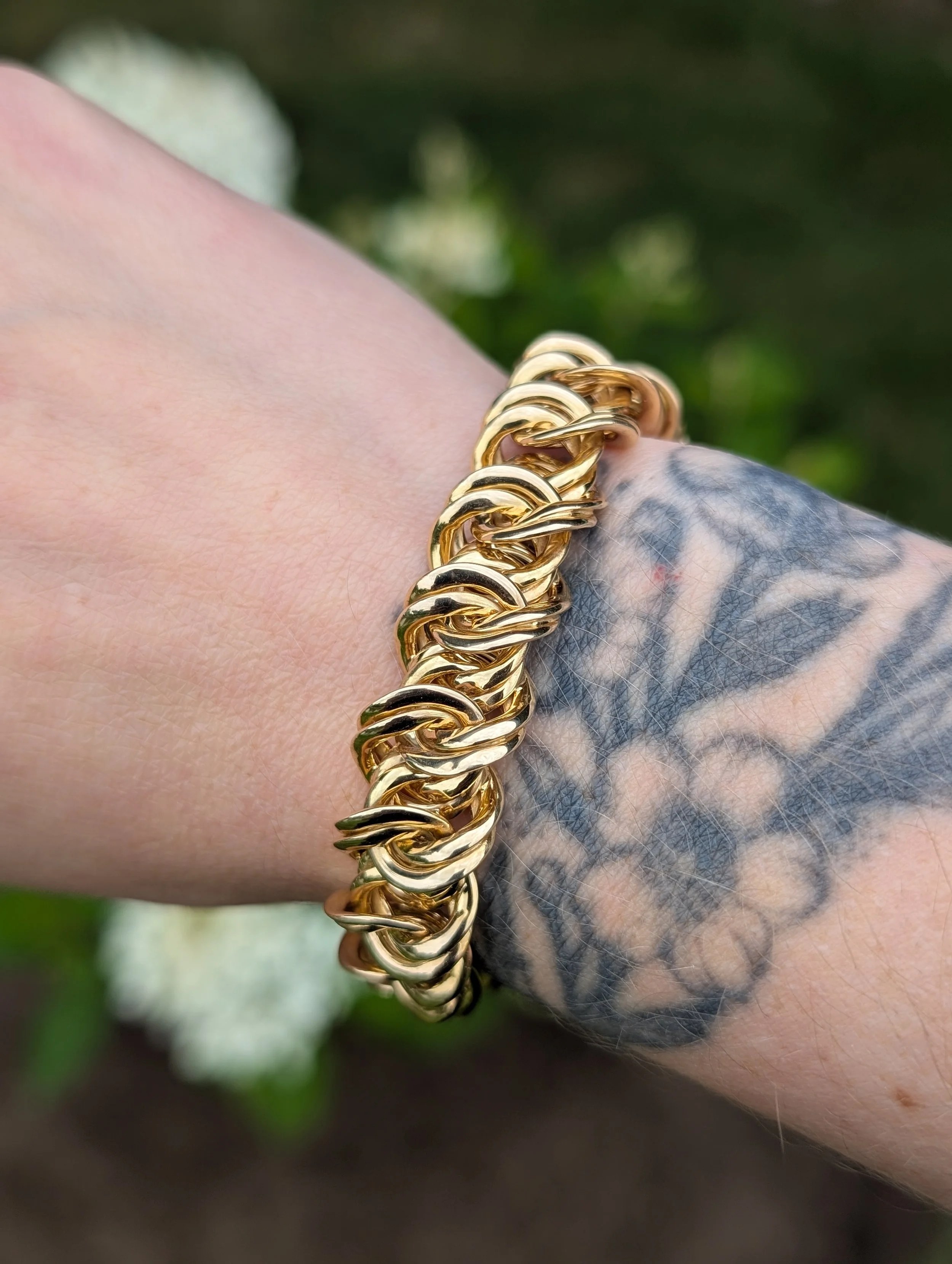 14k yellow gold chunky braided link bracelet. (440-2023)