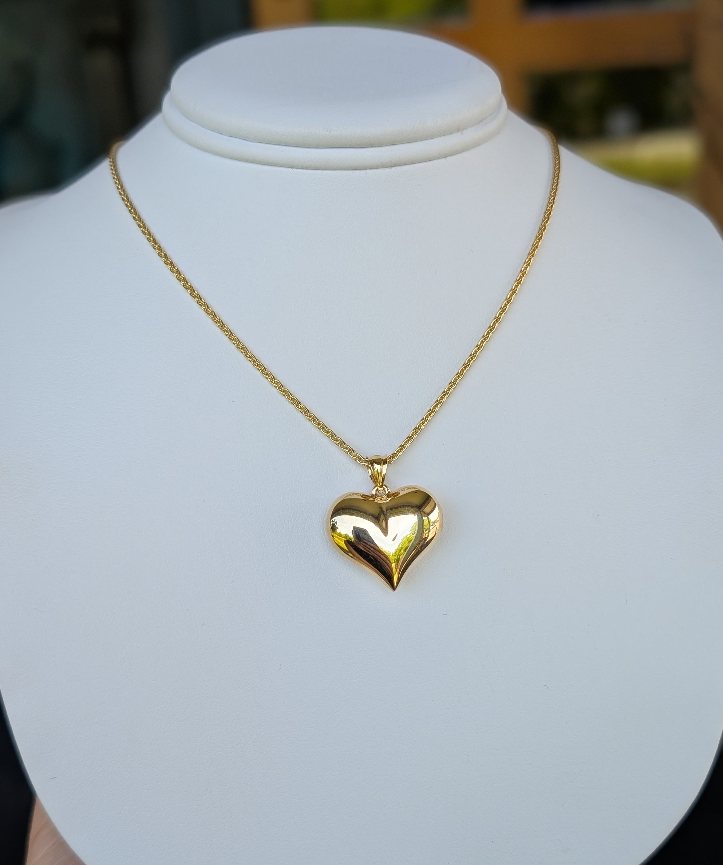 14k yellow gold puffy heart pendant on a 14k yellow gold 20 inch wheat chain. (435-3705)