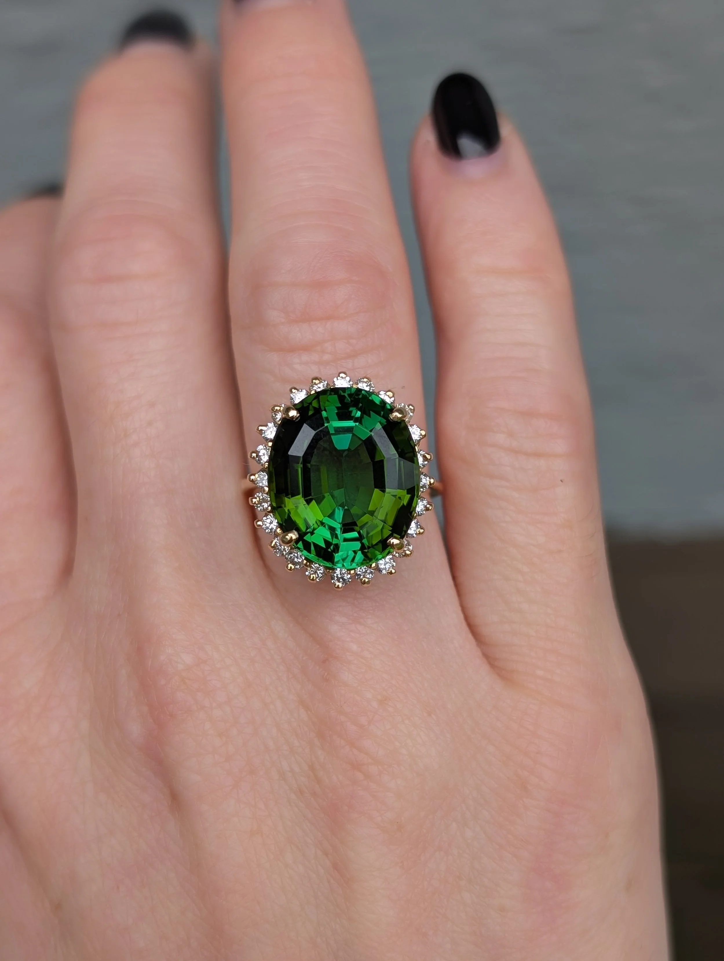 18k yellow gold green tourmaline ring with diamond halo. Size 6.25. (200-2273)